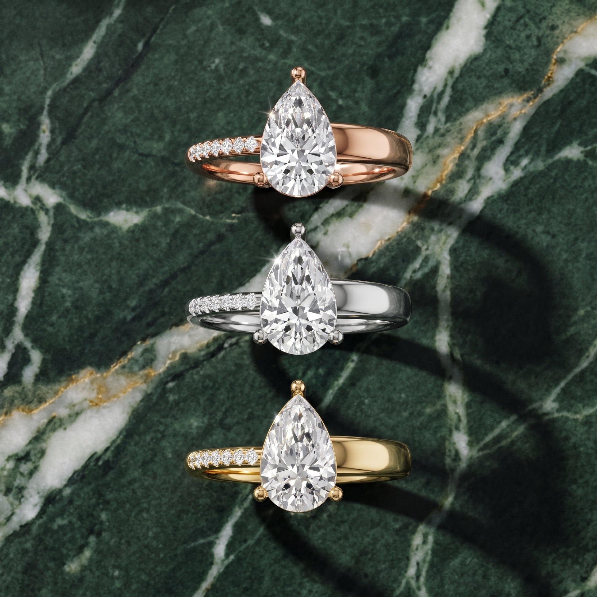Rosie Solitaire Basket Pear Diamond Engagement Ring in White Gold - 3rings.jpg