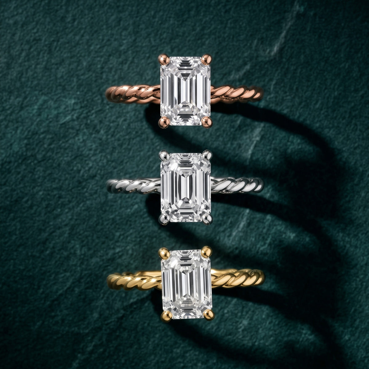 Robyn Twist Solitaire Emerald Diamond Engagement Ring in Yellow Gold - 3rings.jpg