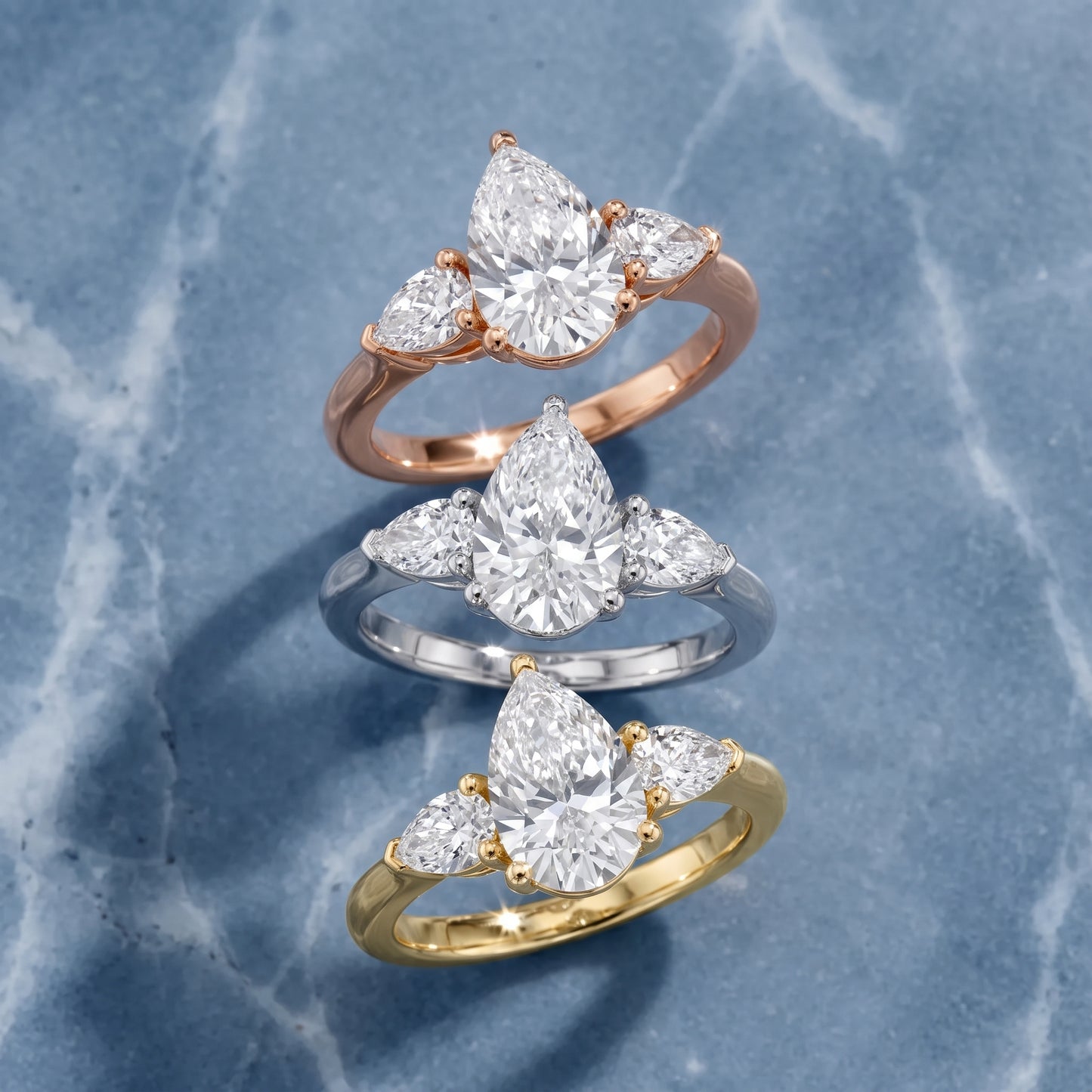 Mirabel Three-Stone Pear Diamond Engagement Ring in Rose Gold - 3rings.jpg