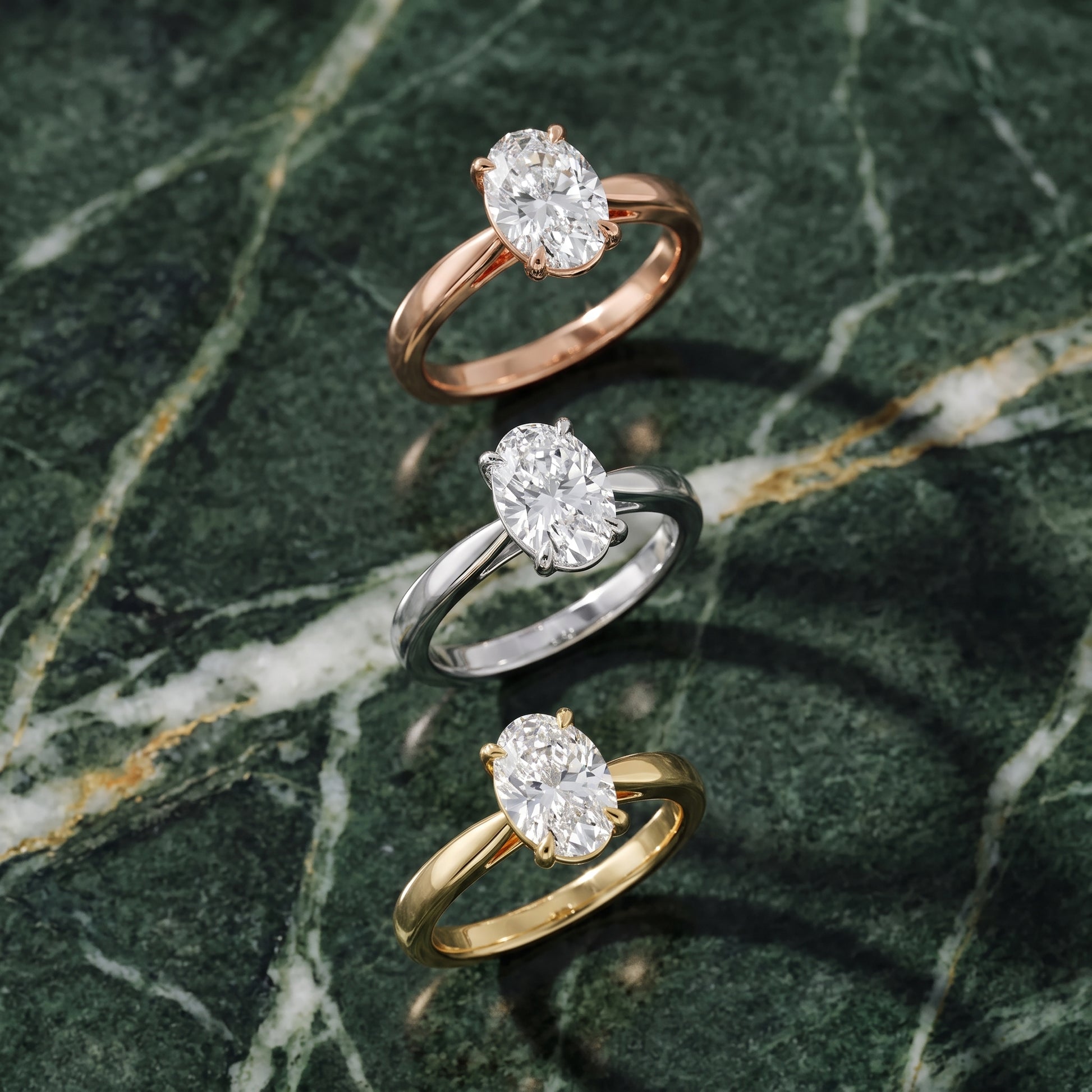 Lucia Solitaire Six-Prong Oval Diamond Engagement Ring in Yellow Gold - 3rings.jpg