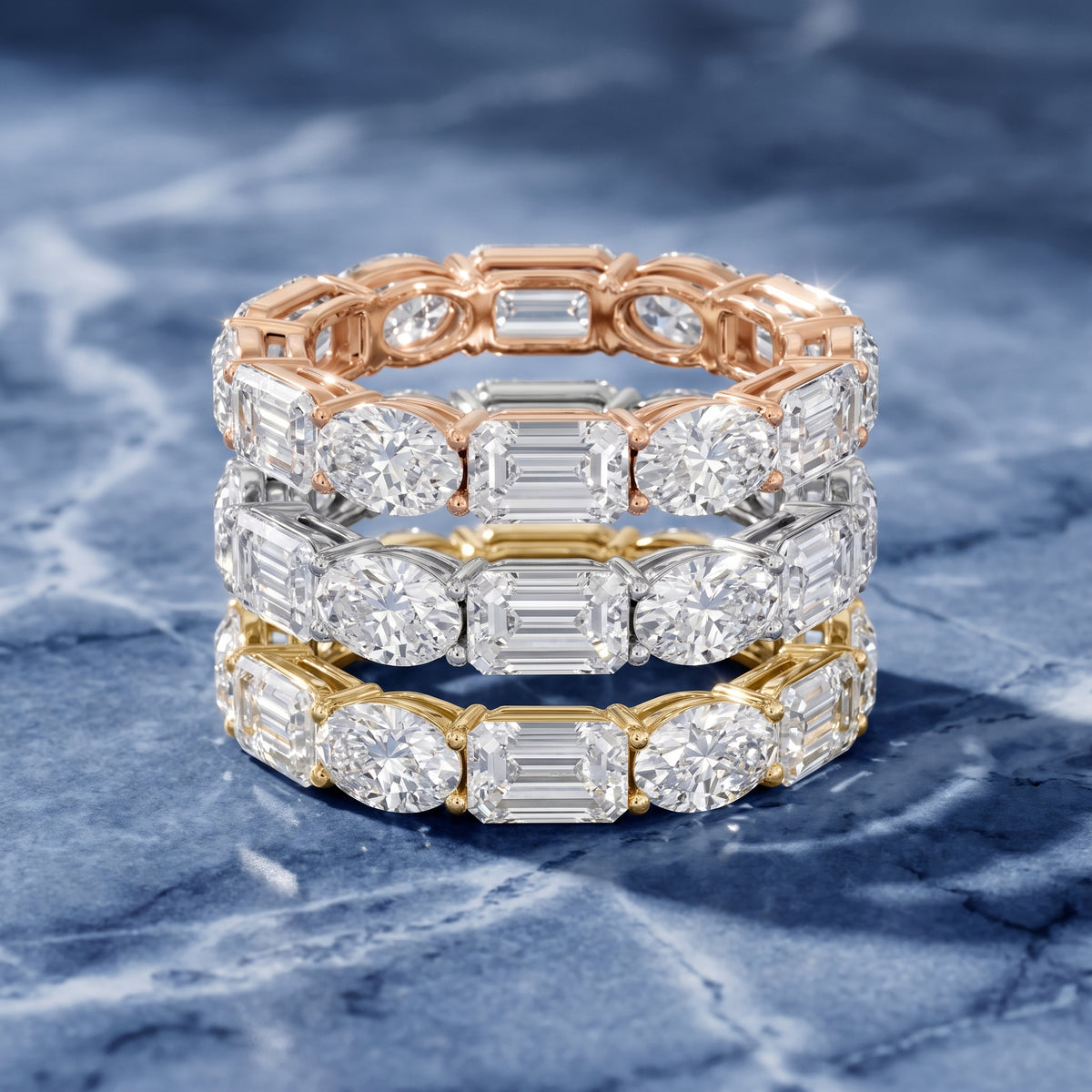 Avery Shared Prong Emerald & Oval Diamond Eternity Band in White Gold - 3rings.jpg