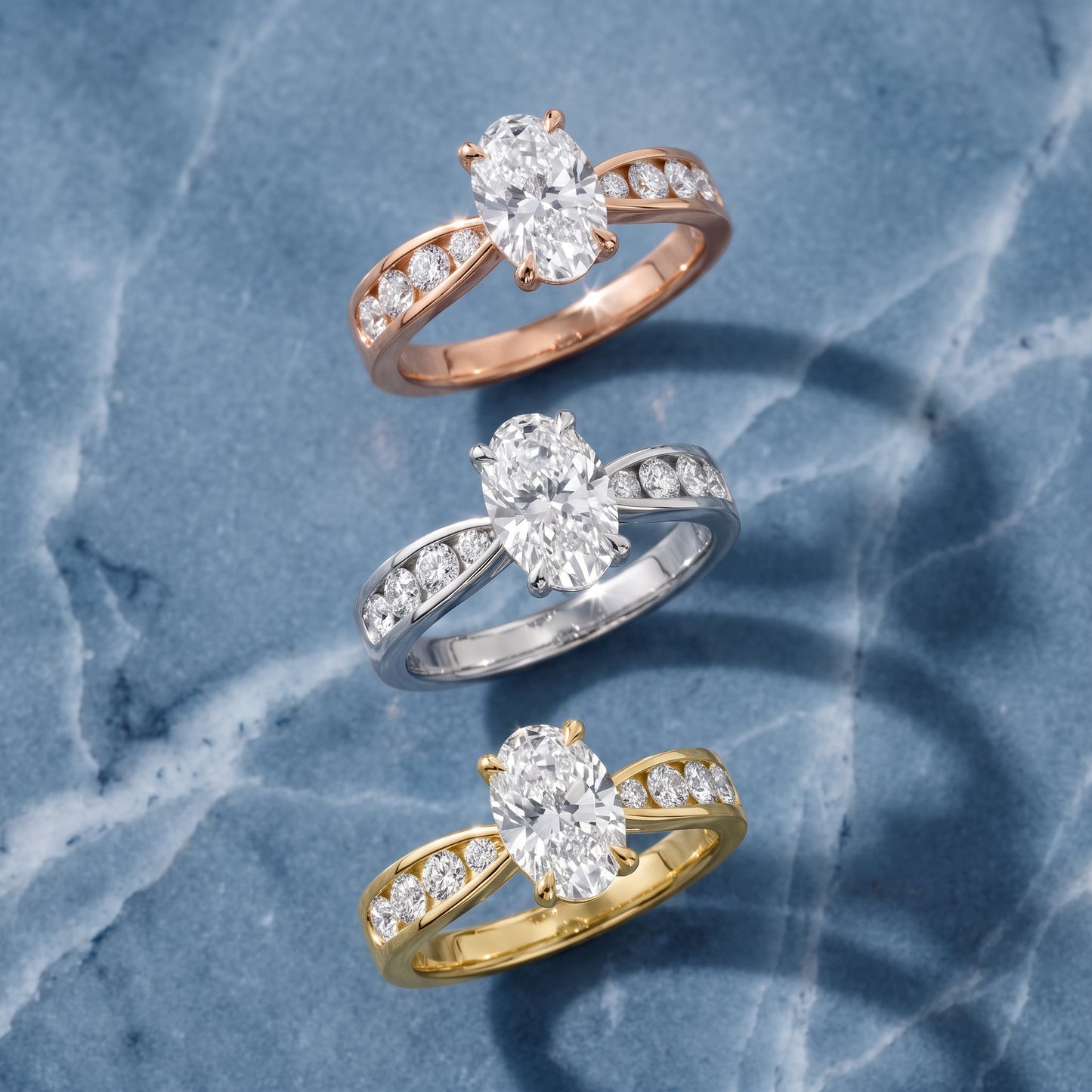 Noor Channel Set Sidestone Oval Diamond Engagement Ring in Rose Gold - 3rings.jpg