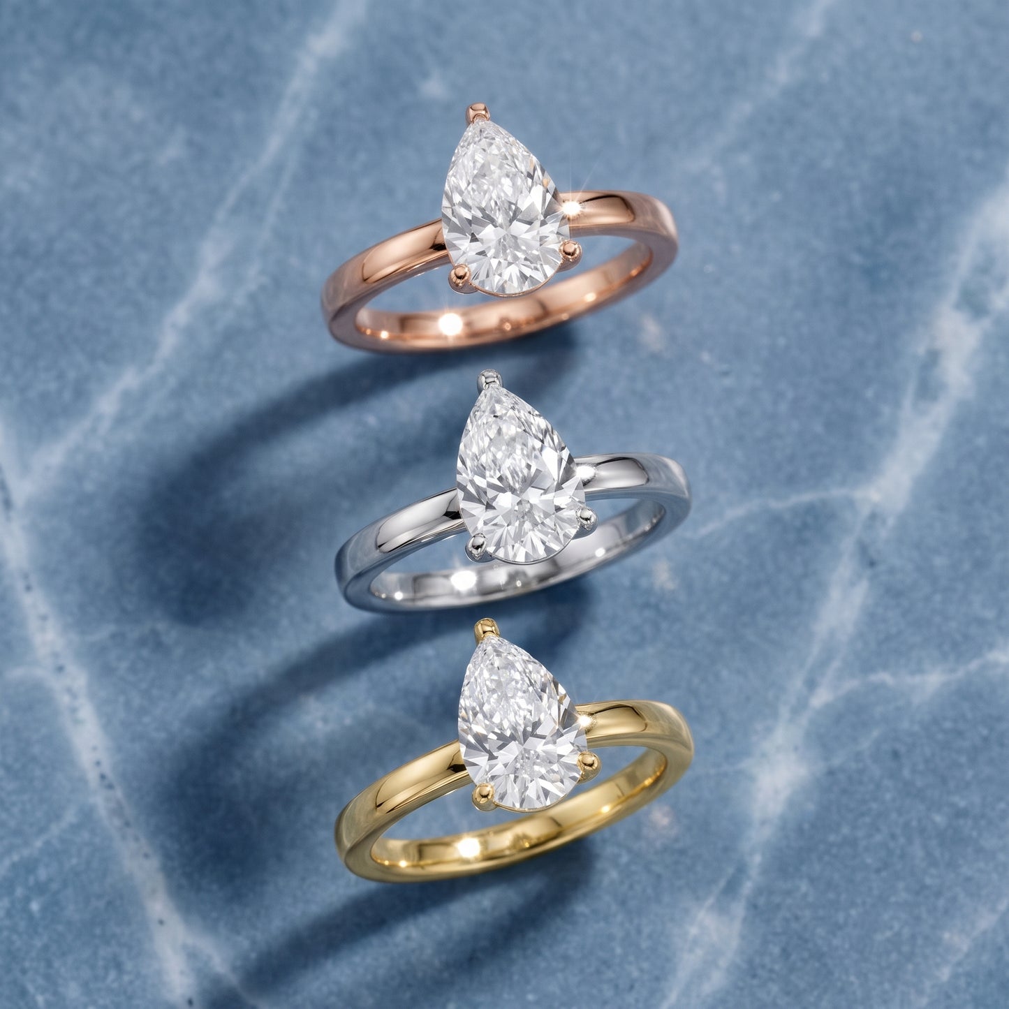 Delia Solitaire Pear Diamond Engagement Ring in White Gold - 3rings.jpg