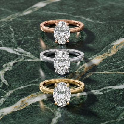 Delia Solitaire Oval Diamond Engagement Ring in White Gold - 3rings.jpg