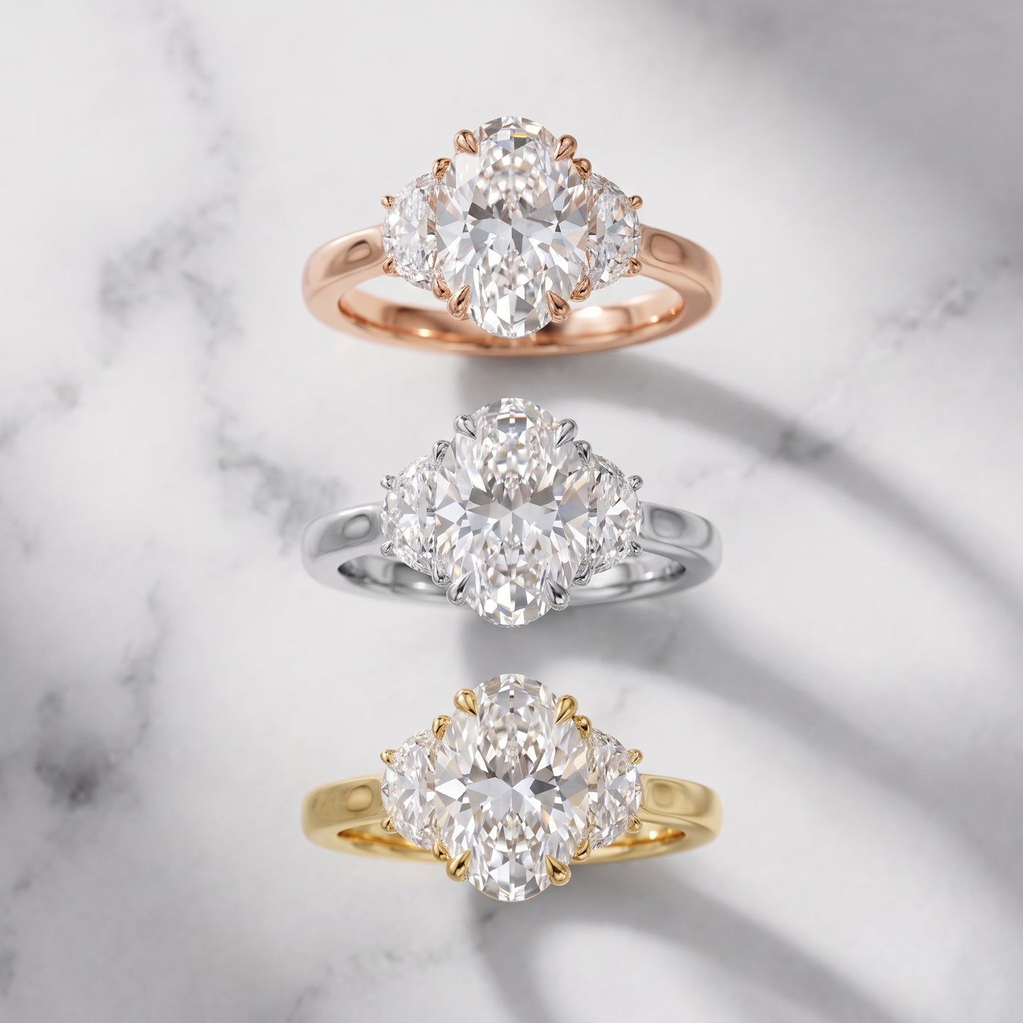 Romy Three-Stone Oval Diamond Engagement Ring in Platinum - 3rings.jpg