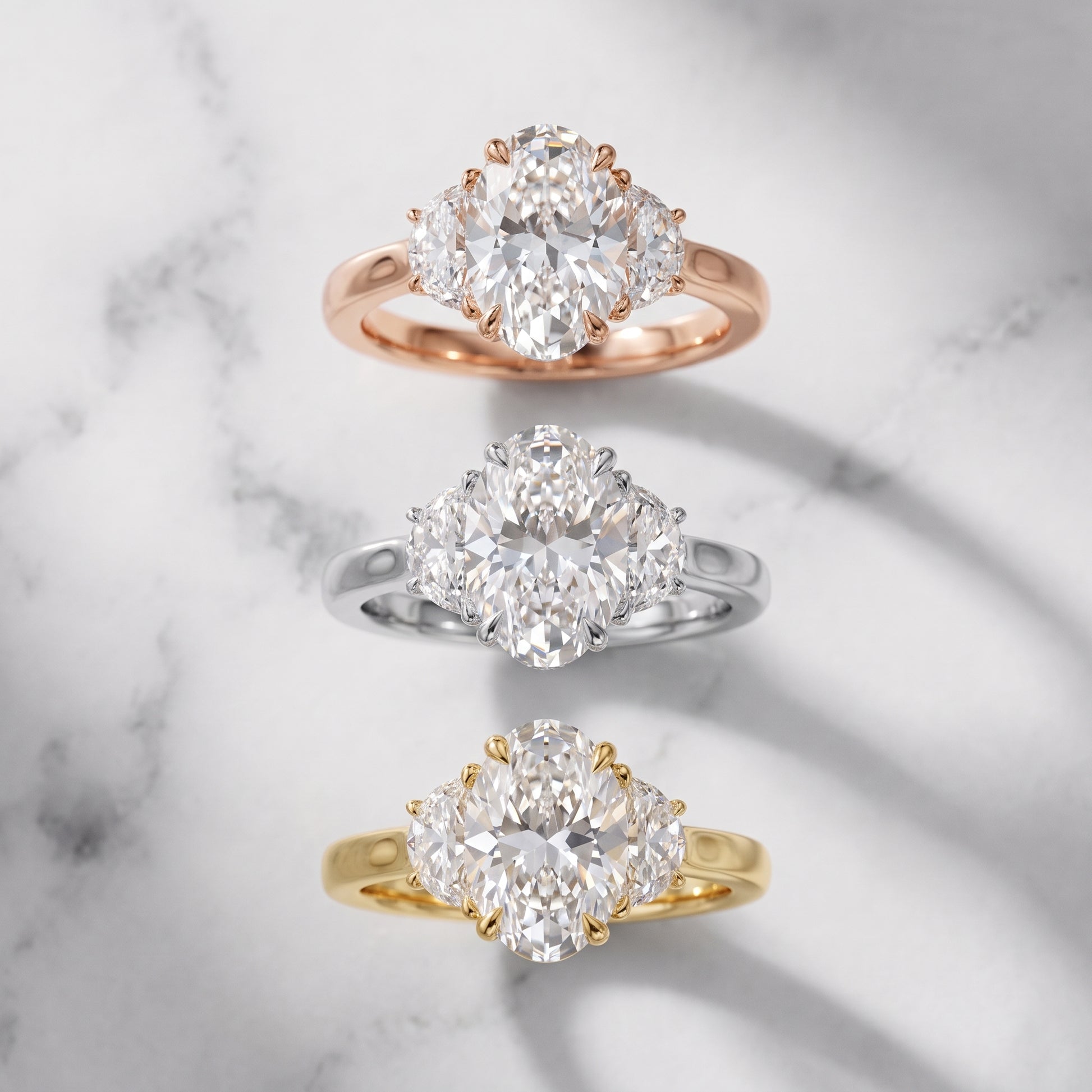 Romy Three-Stone Oval Diamond Engagement Ring in Platinum - 3rings.jpg