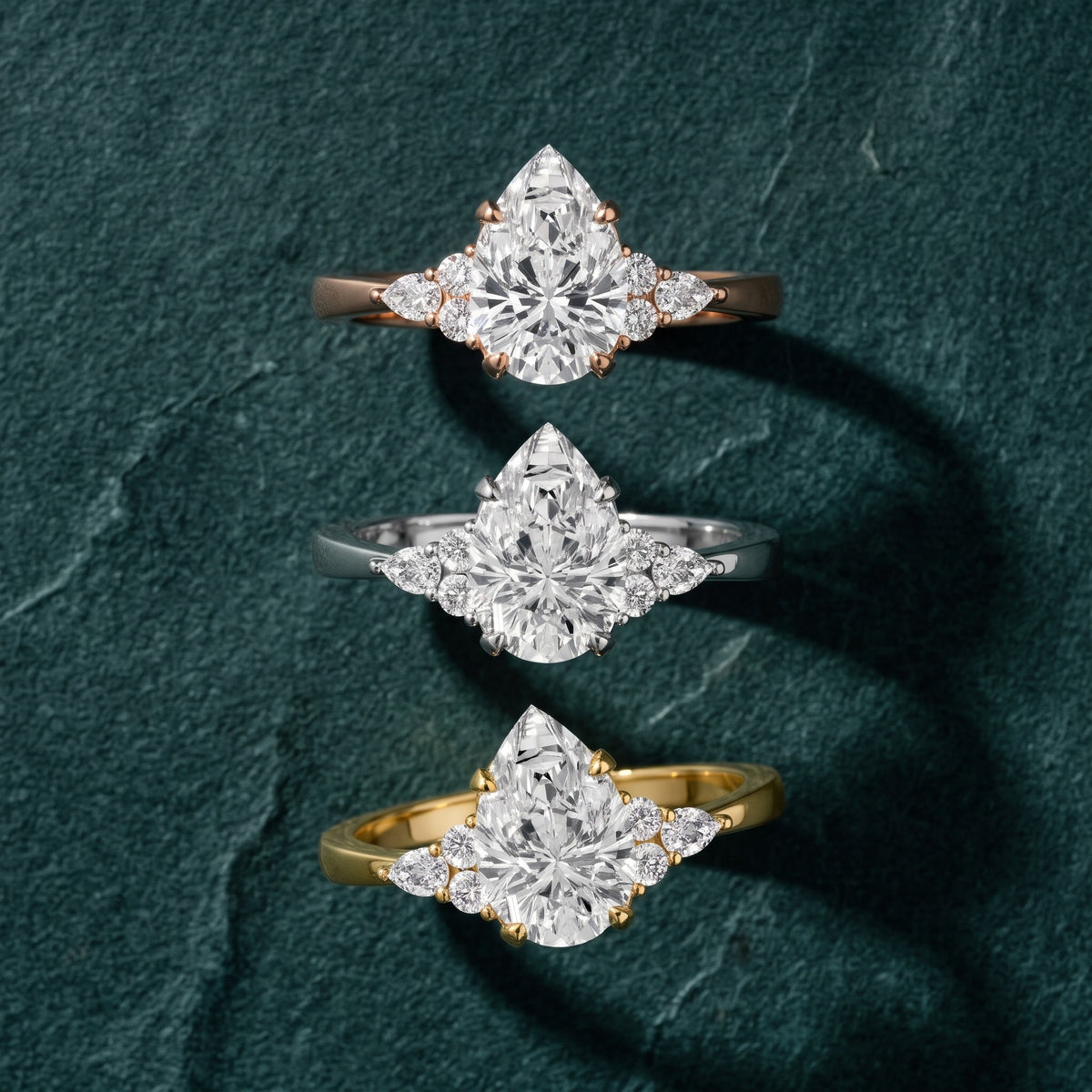 Amelia Three Stone Pear Diamond Engagement Ring in Yellow Gold - 3rings.jpg