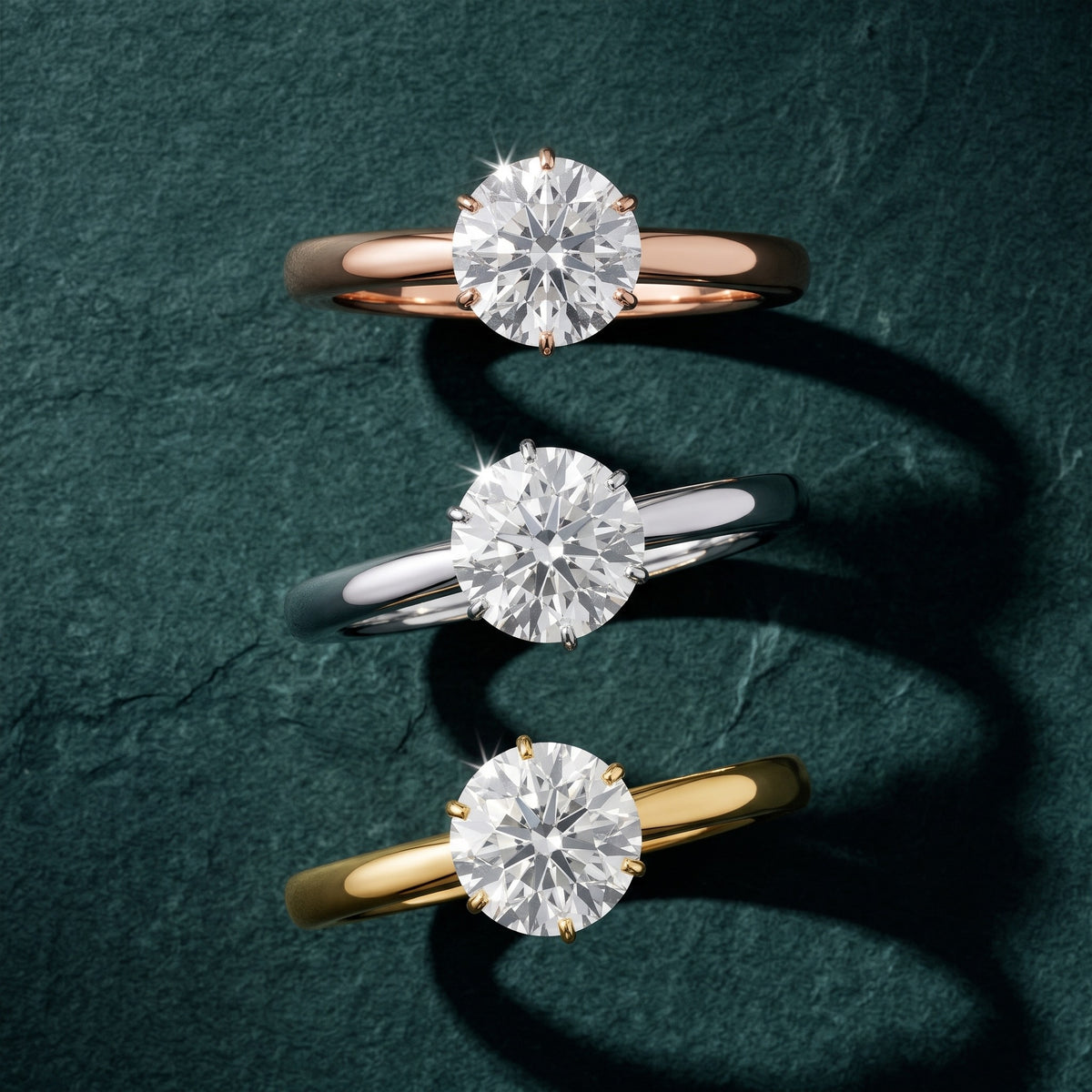 Serena Blossom Solitaire Round Diamond Engagement Ring in Platinum - 3rings.jpg