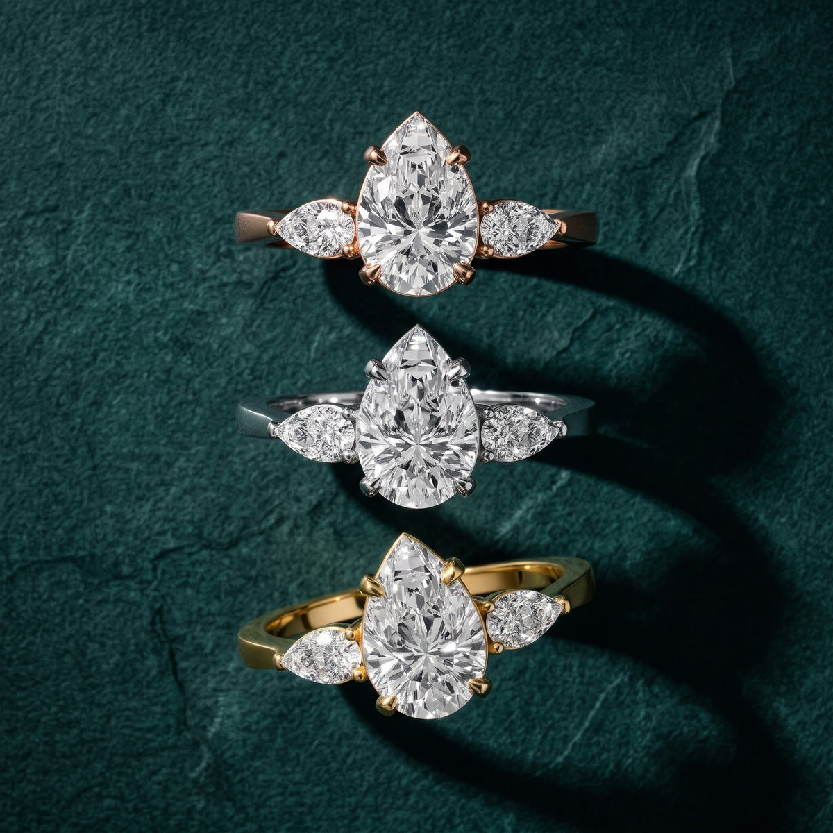Grace Three Stone Pear Diamond Engagement Ring in White Gold - 3rings.jpg