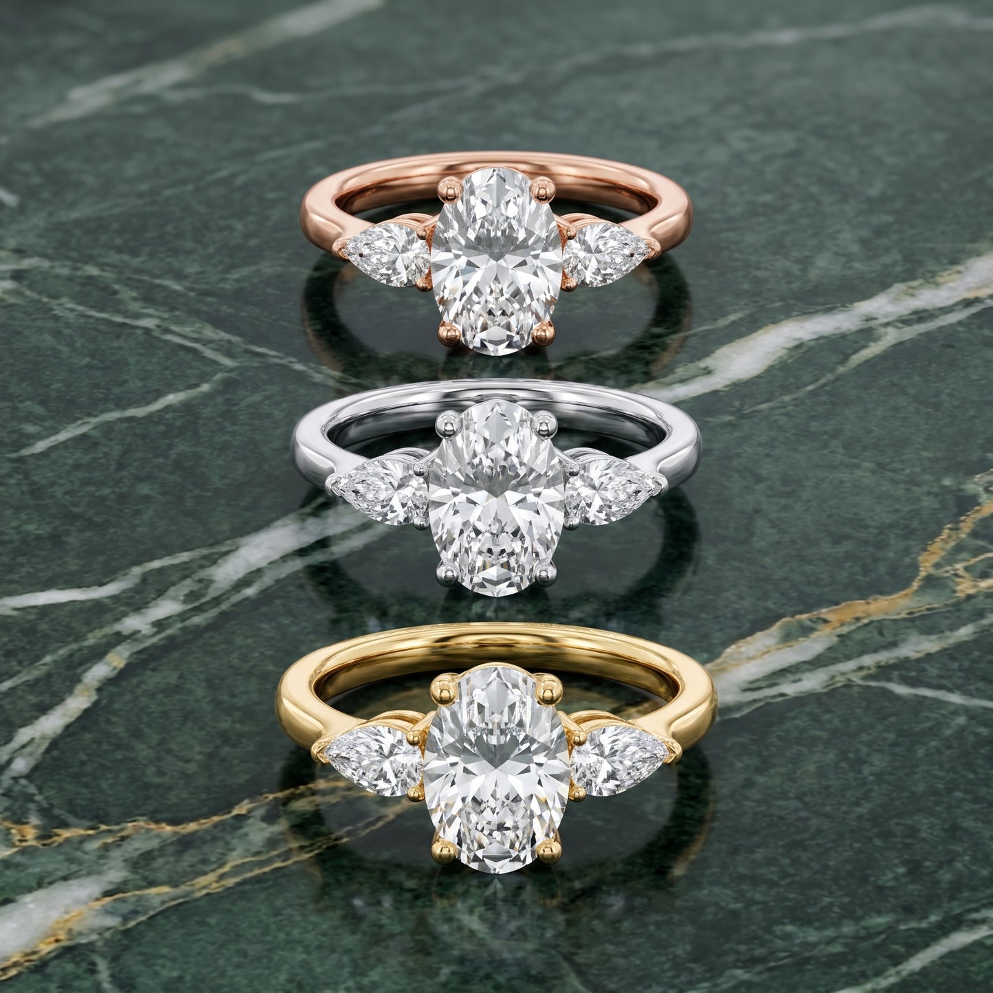 Faye Three-Stone Trellis Oval Diamond Ring in Yellow Gold - 3rings.jpg