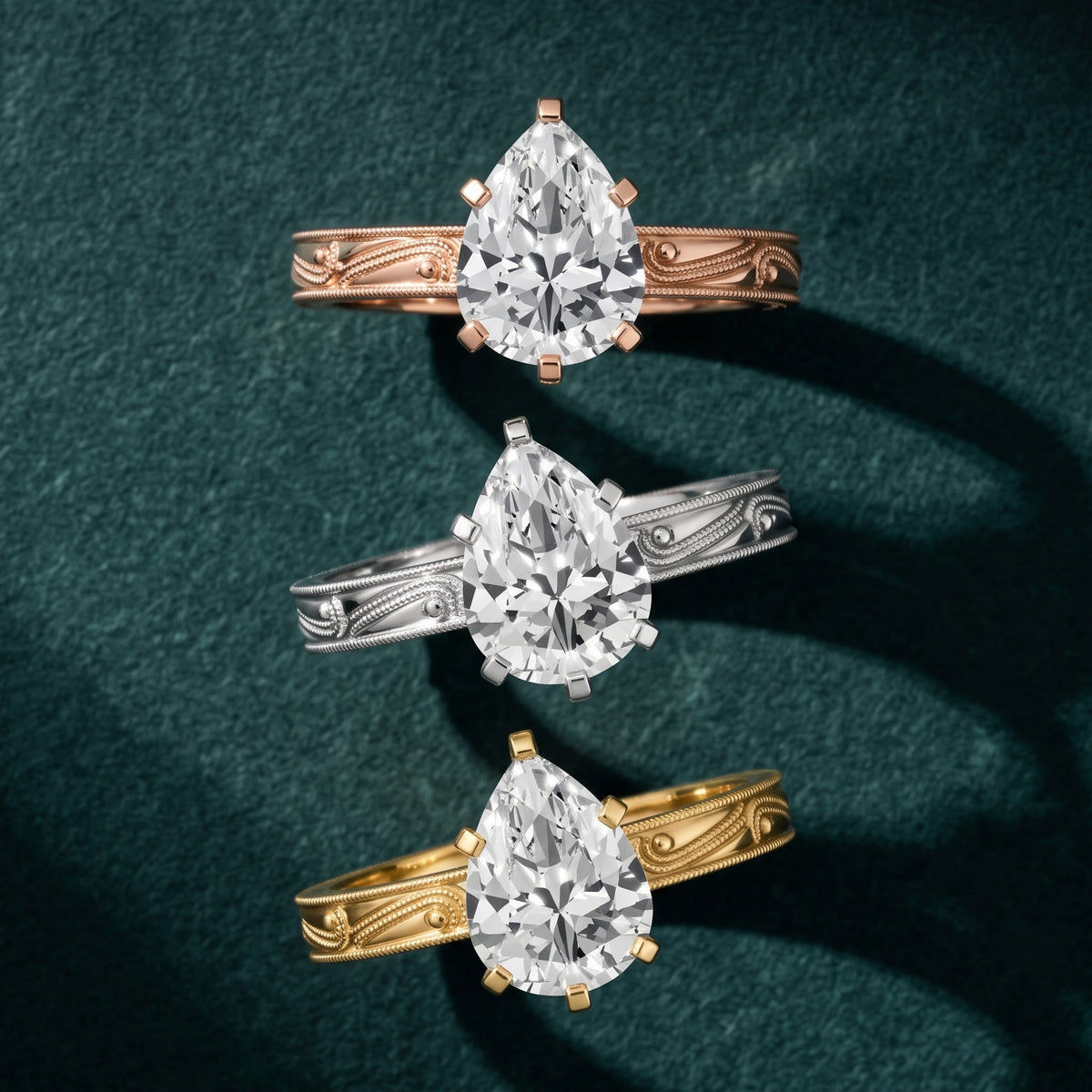 Abbie Engraved Solitaire Pear Diamond Engagement Ring in Platinum - 3rings.jpg