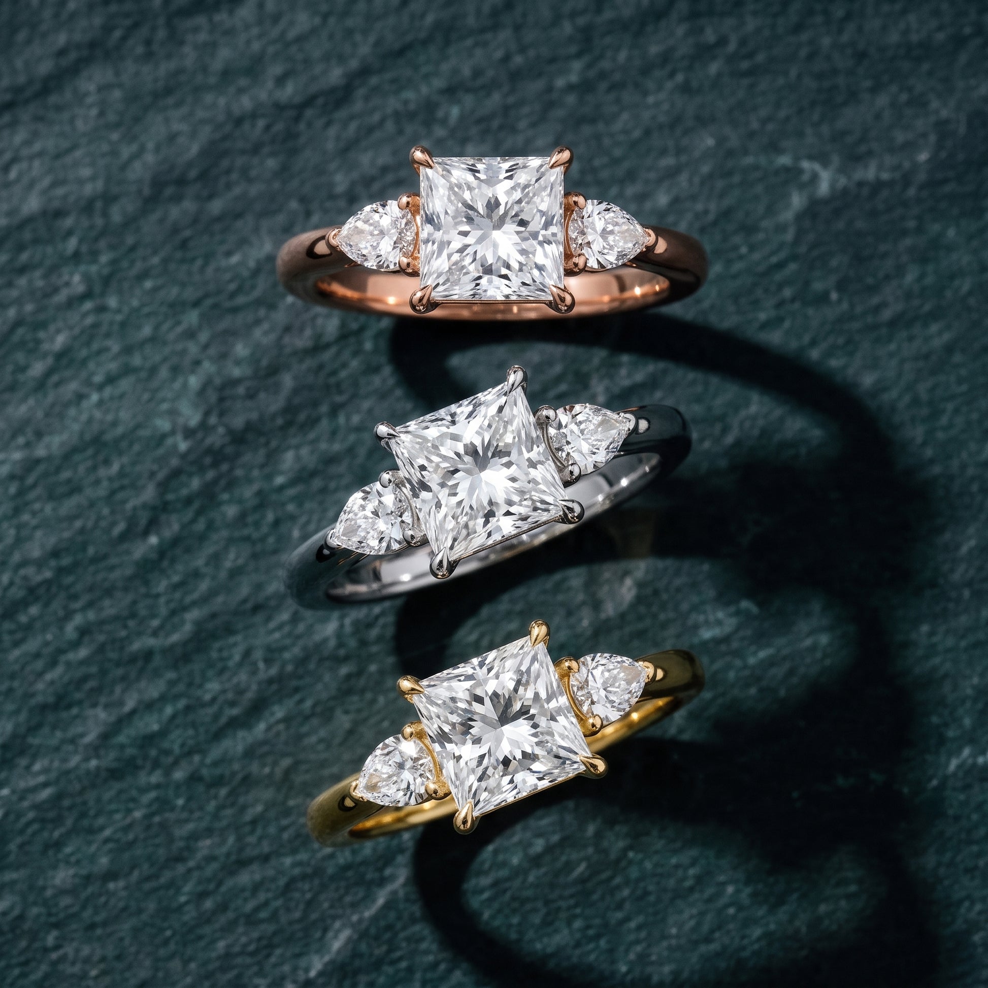 Phoebe Three-Stone Princess Diamond Ring in Yellow Gold - 3rings.jpg