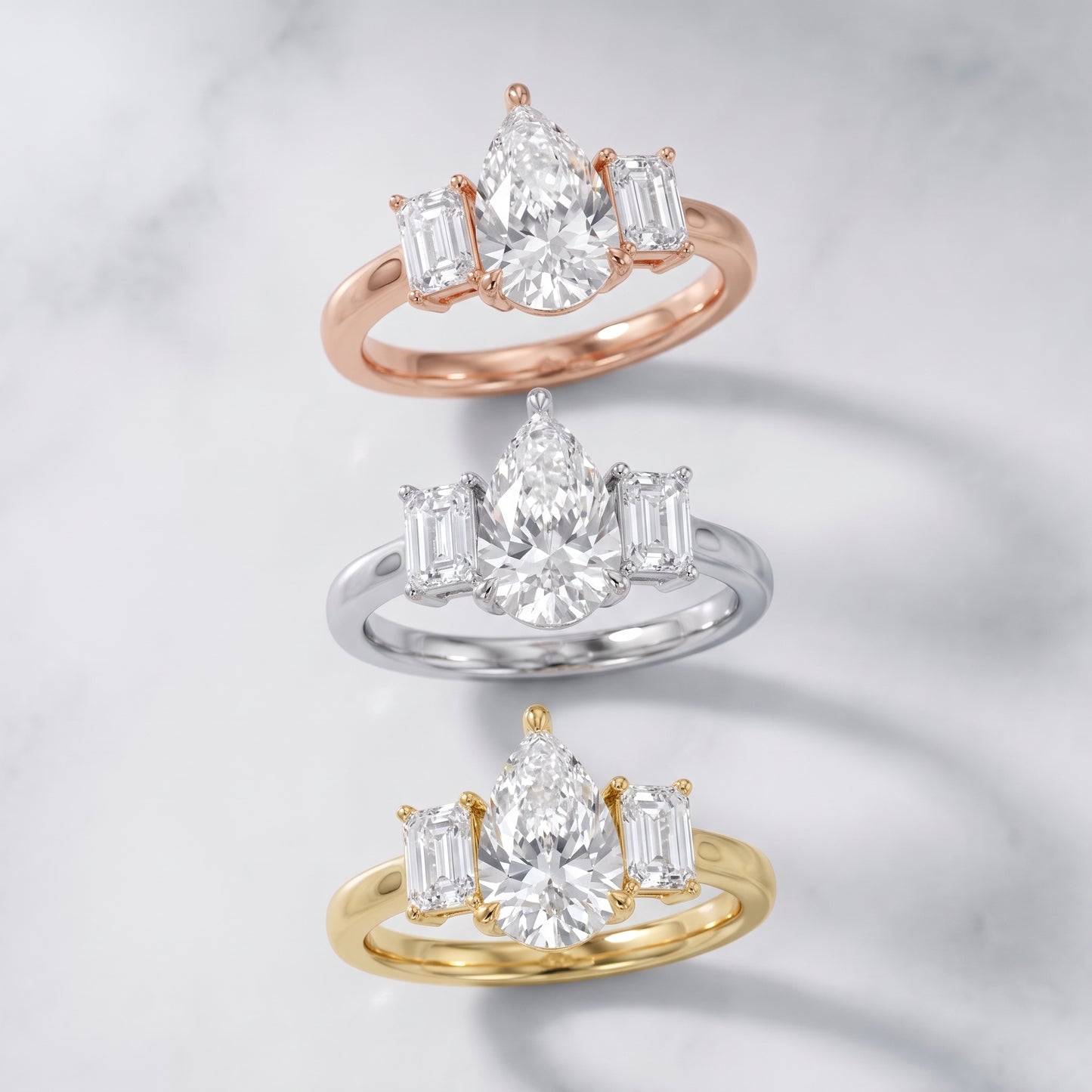 Zoe Three-Stone Pear Diamond Ring in Platinum - 3rings.jpg