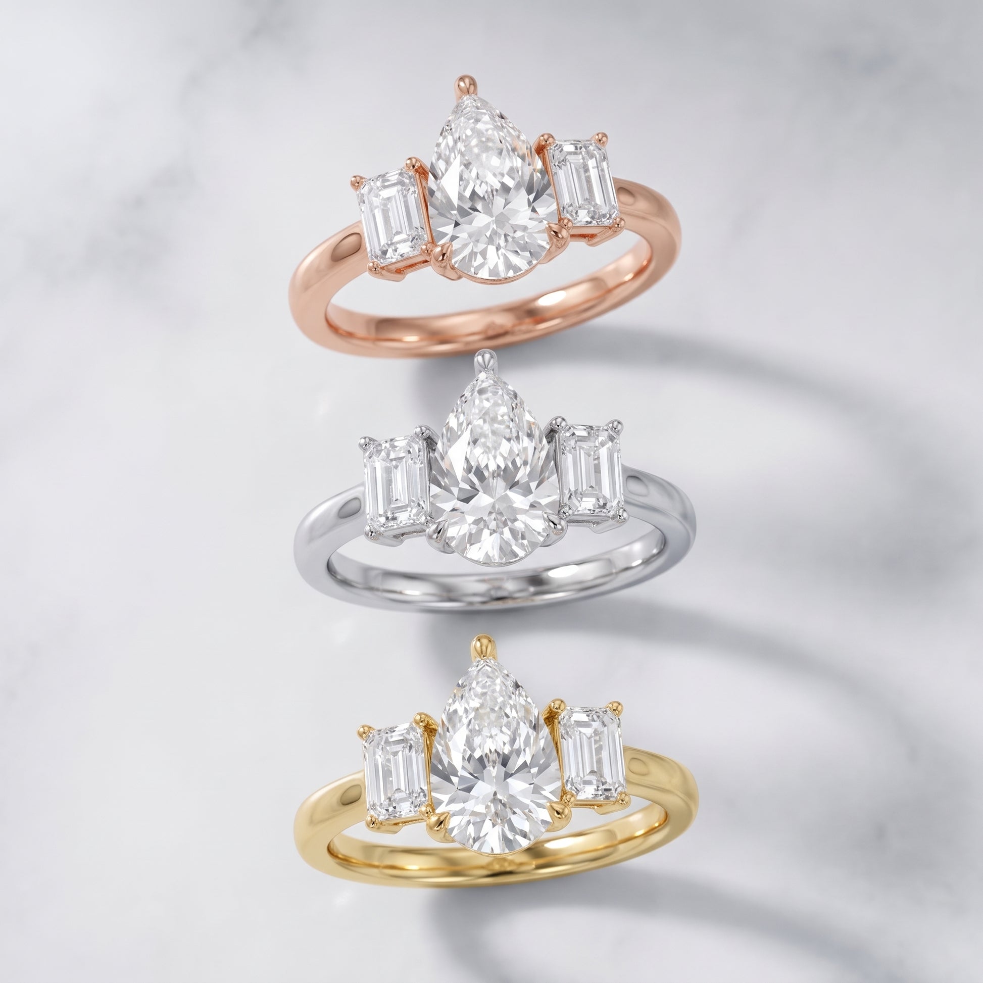 Zoe Three-Stone Pear Diamond Ring in Platinum - 3rings.jpg