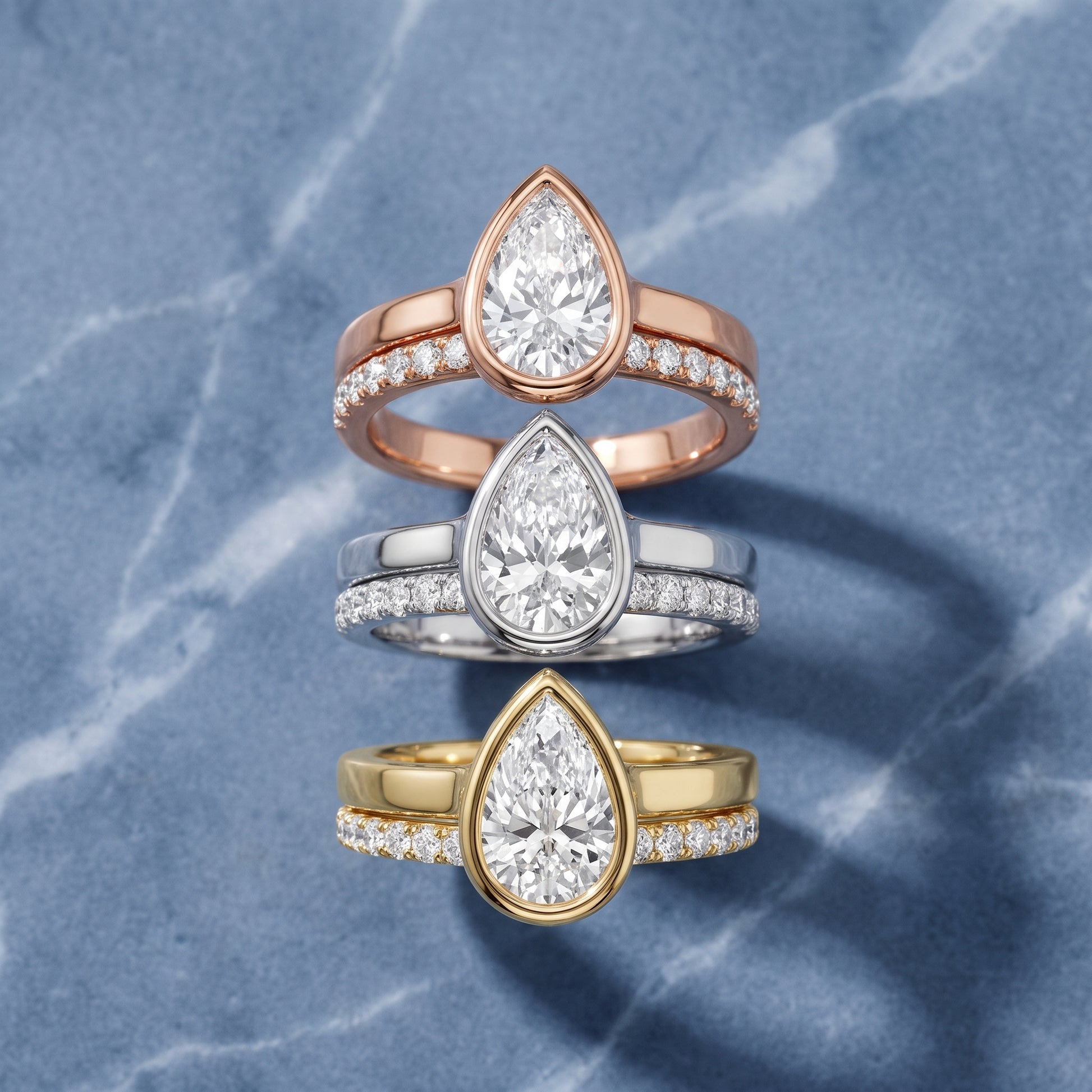 Ayla Bezel Bypass Pear Diamond Ring in Yellow Gold - 3rings.jpg