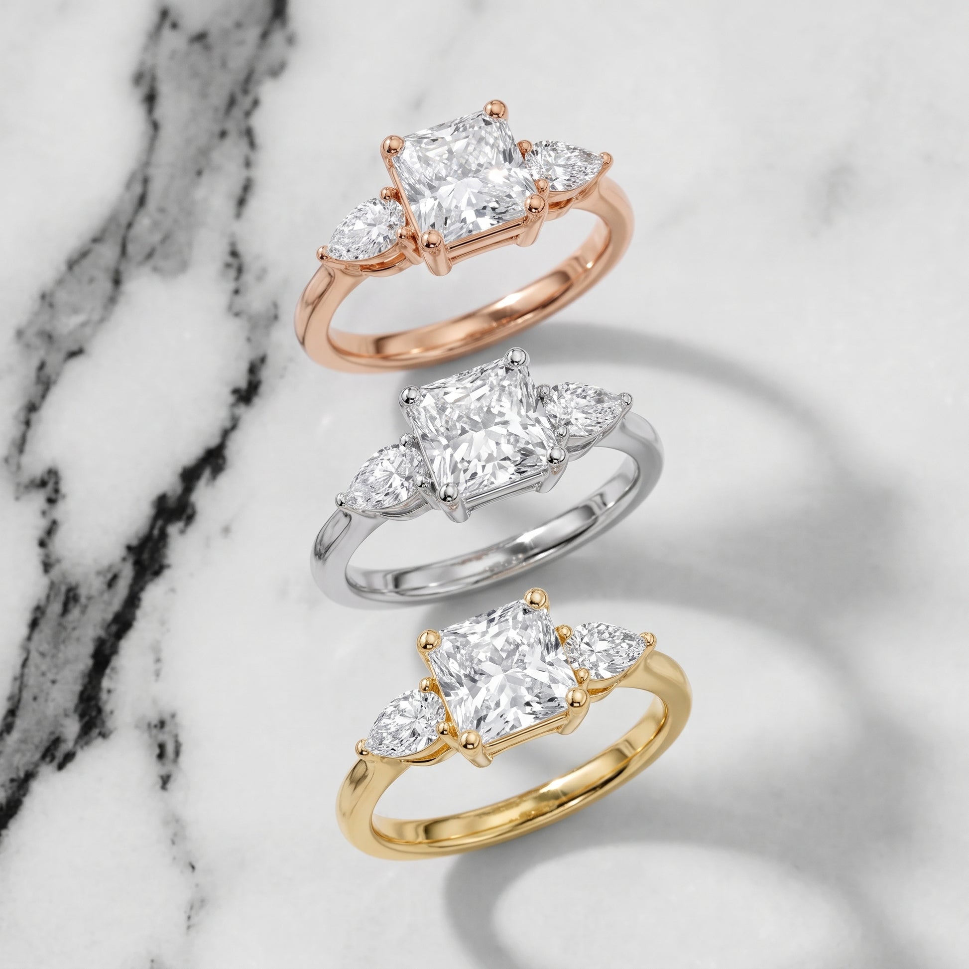 Faye Three-Stone Trellis Radiant Diamond Ring in Rose Gold - 3rings.jpg