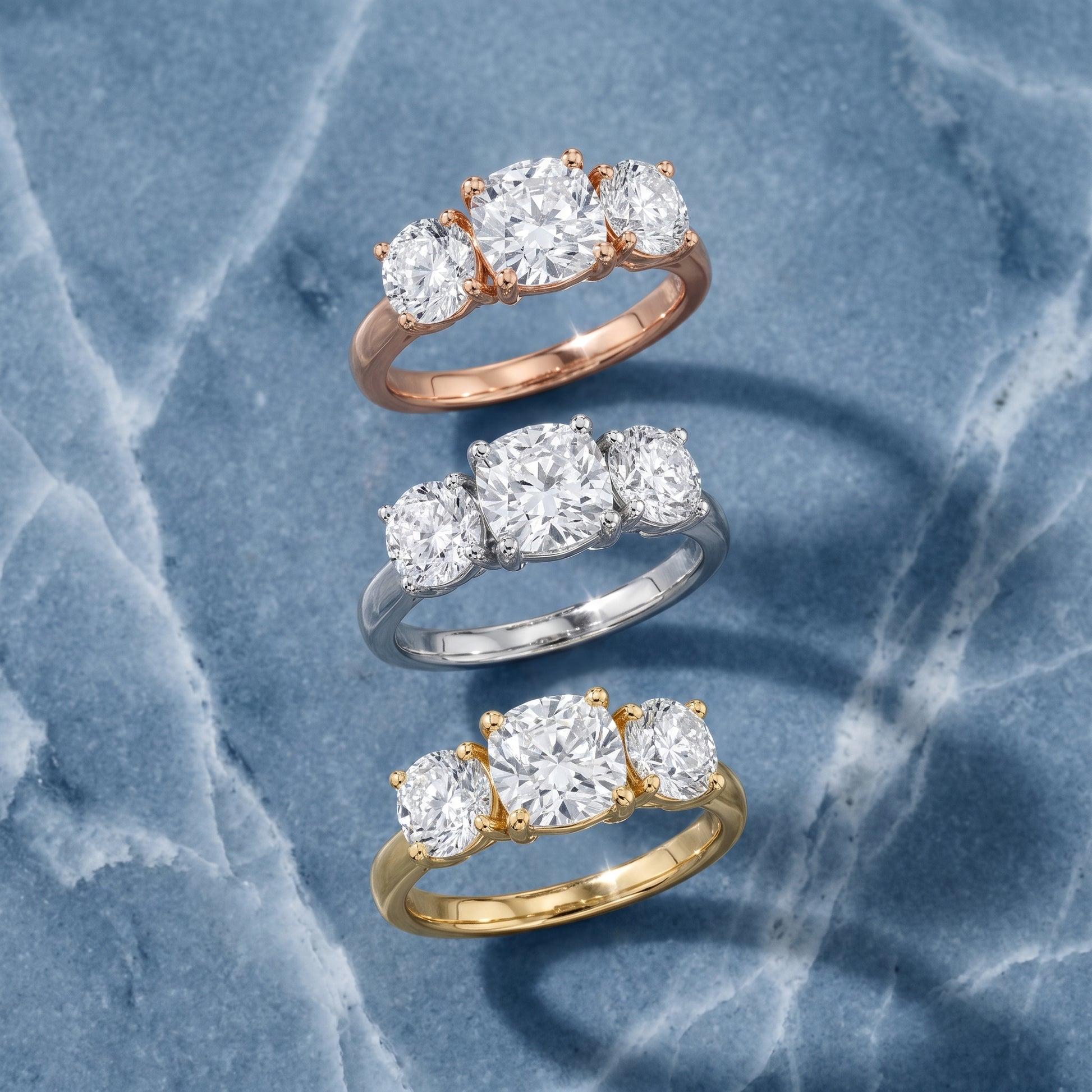 Esme Three-Stone Tapered Cushion Diamond Ring in Yellow Gold - 3rings.jpg
