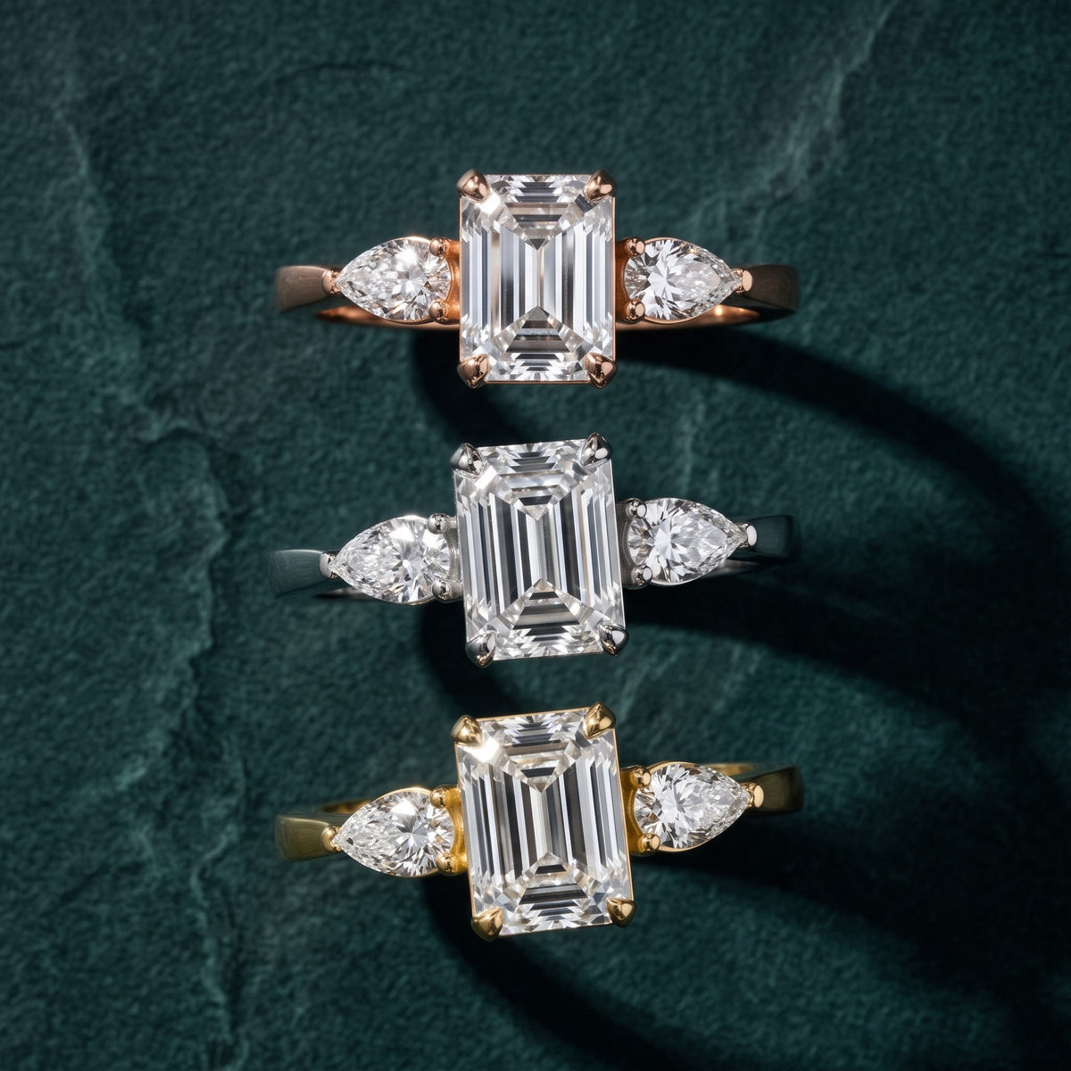 Grace Three Stone Emerald Diamond Engagement Ring in Platinum - 3rings.jpg