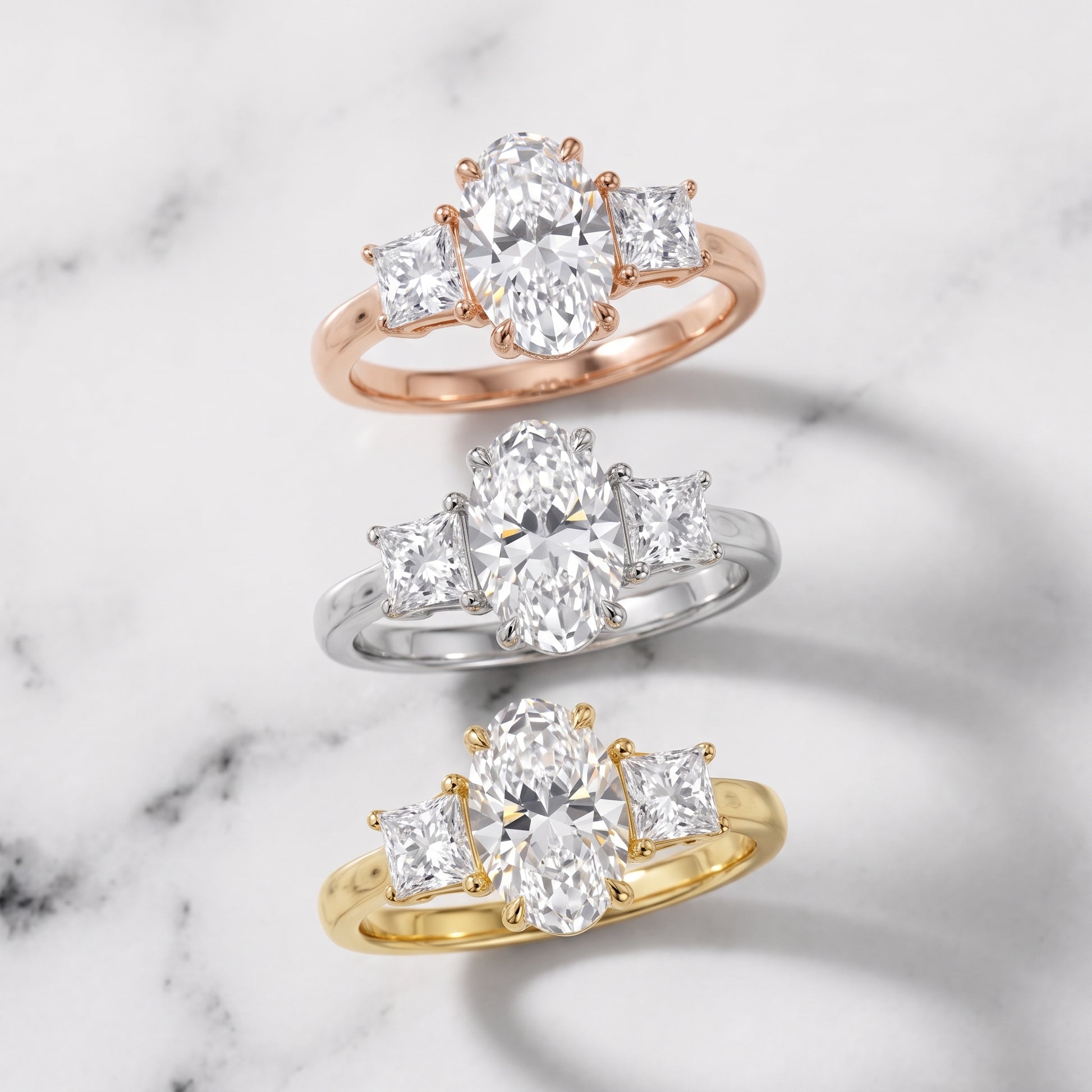 Sienna Three-Stone Oval Diamond Ring in Platinum - 3rings.jpg