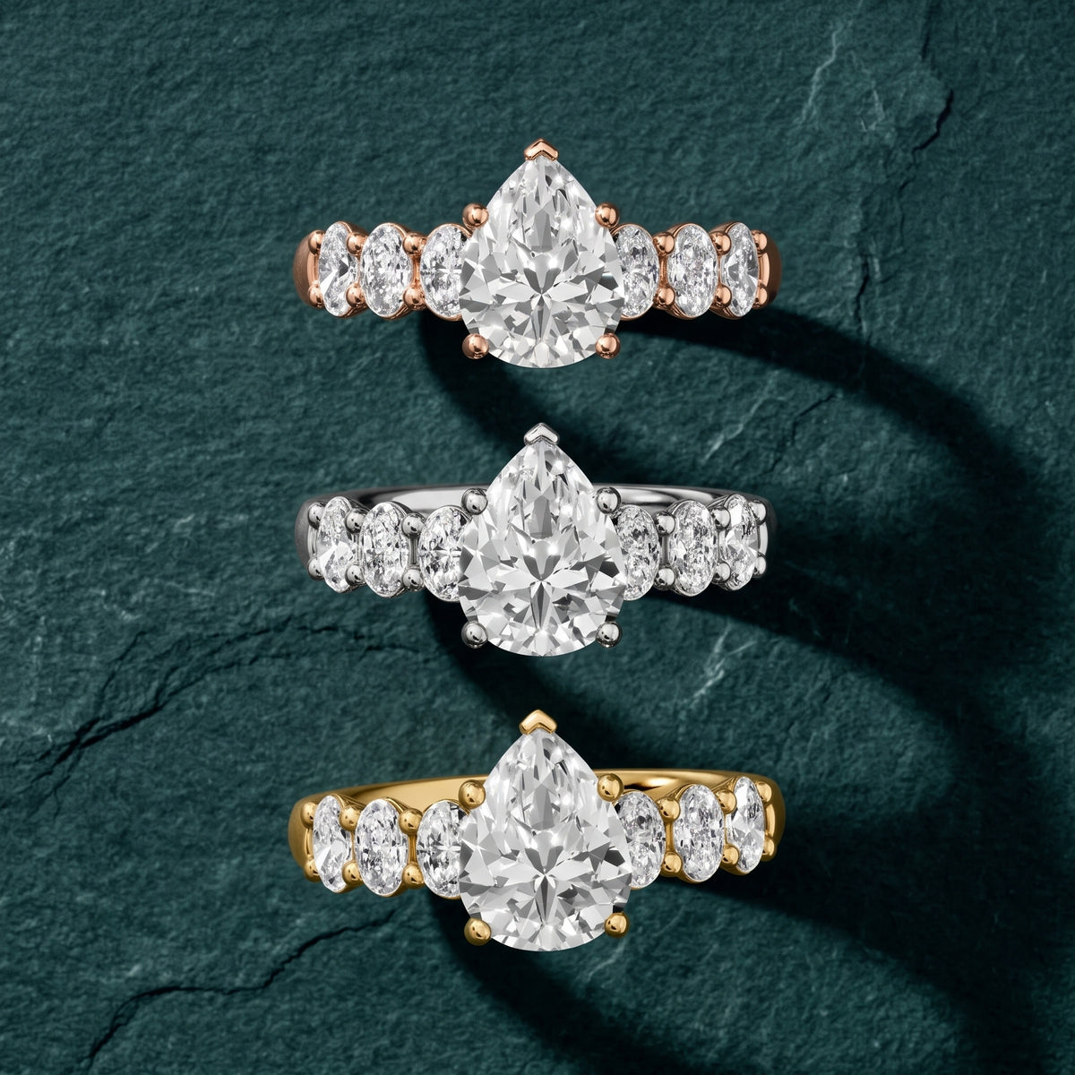 Kiera Graduated Seven-Stone Pear Diamond Engagement Ring in Yellow Gold - 3rings.jpg