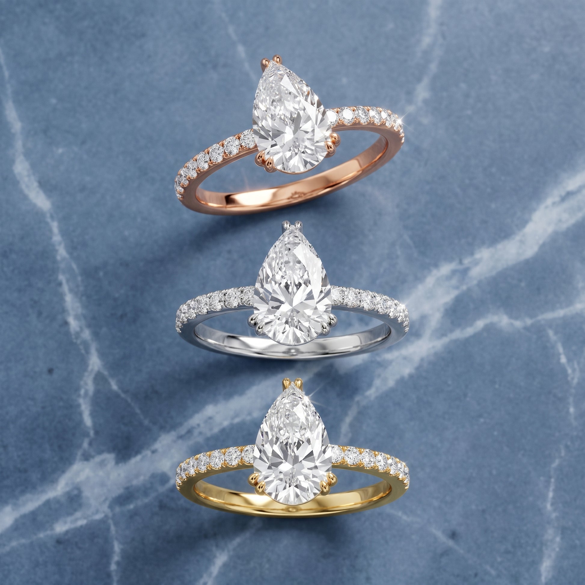 Novara Solitaire Pavé Pear Diamond Ring in Rose Gold - 3rings.jpg