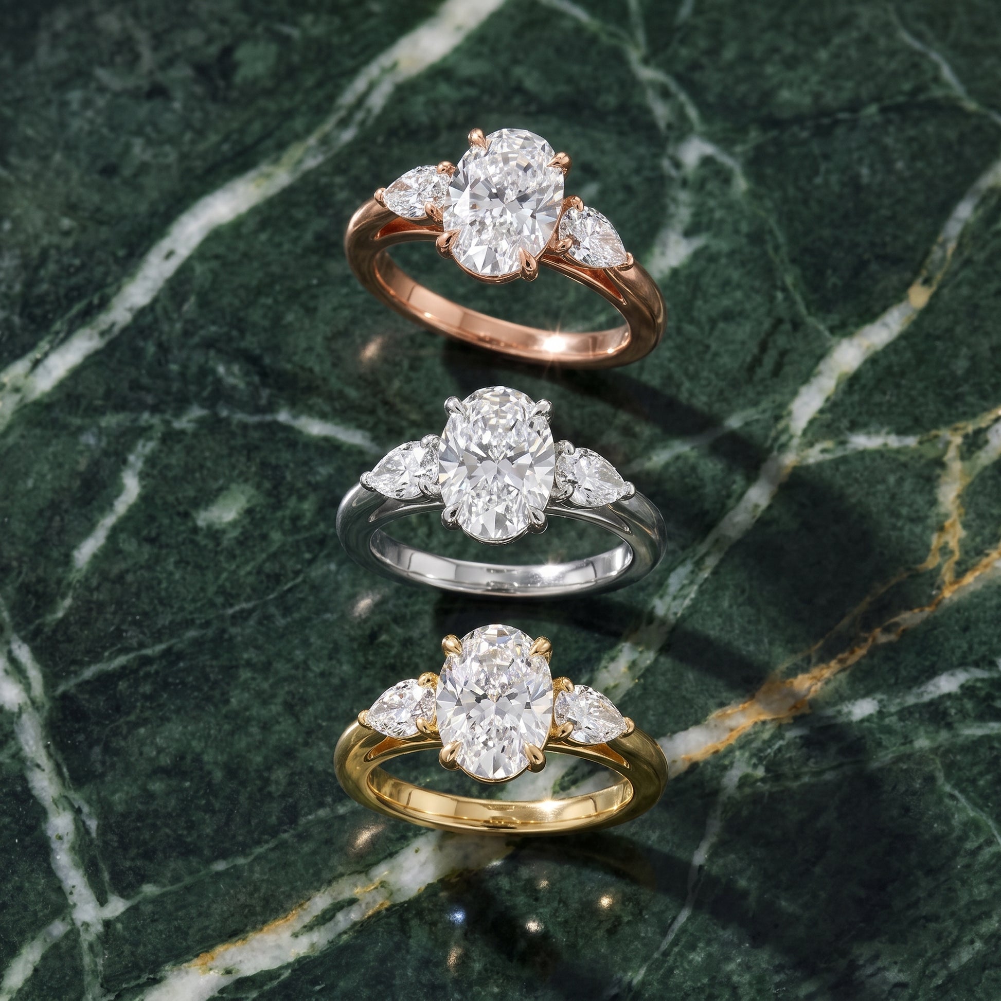 Phoebe Three-Stone Oval Diamond Ring in Platinum - 3rings.jpg