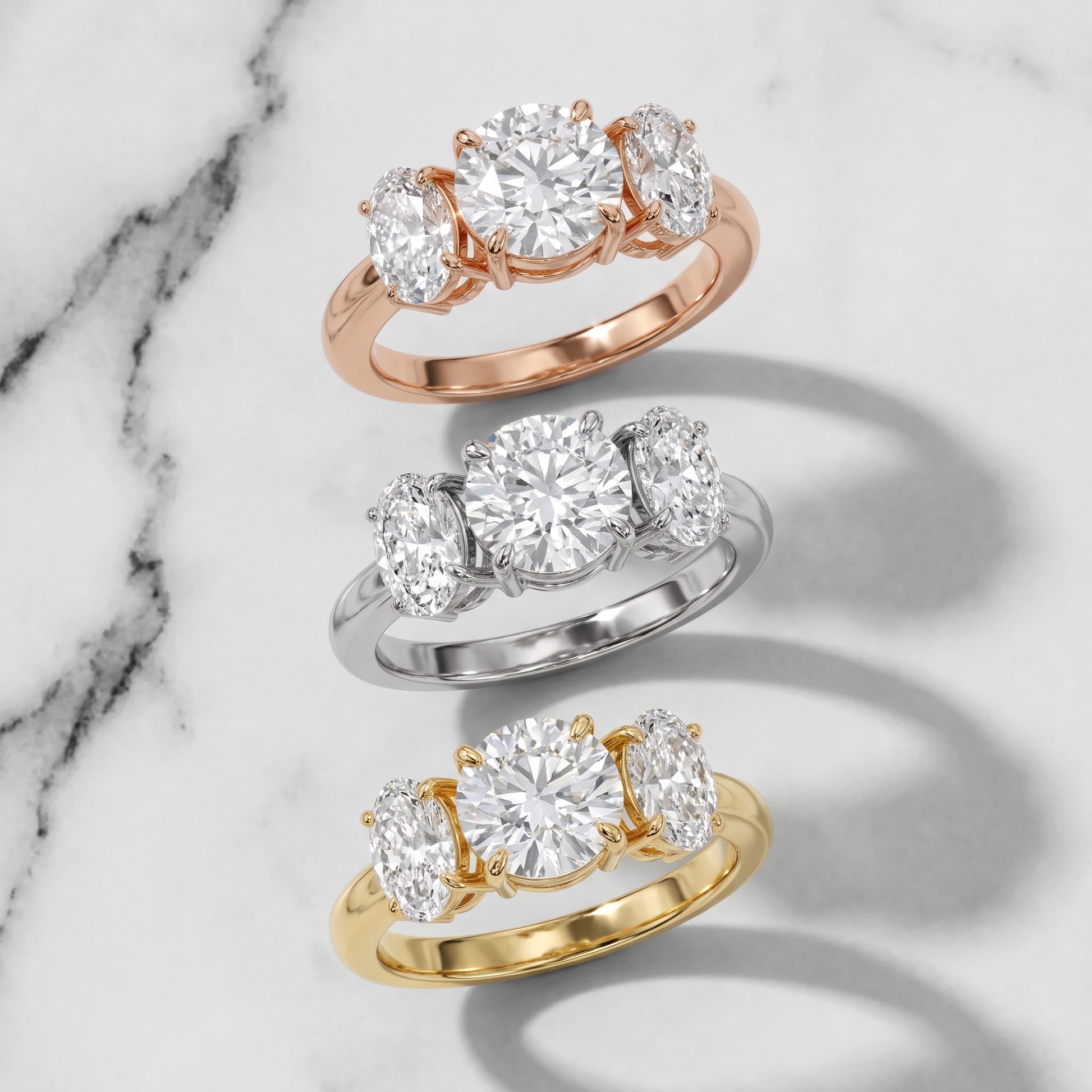 Lila Three-Stone Round Diamond Ring in Rose Gold - 3rings.jpg