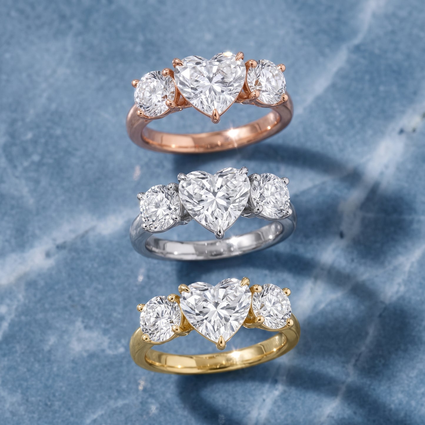 Esme Three-Stone Tapered Heart Diamond Ring in Platinum - 3rings.jpg