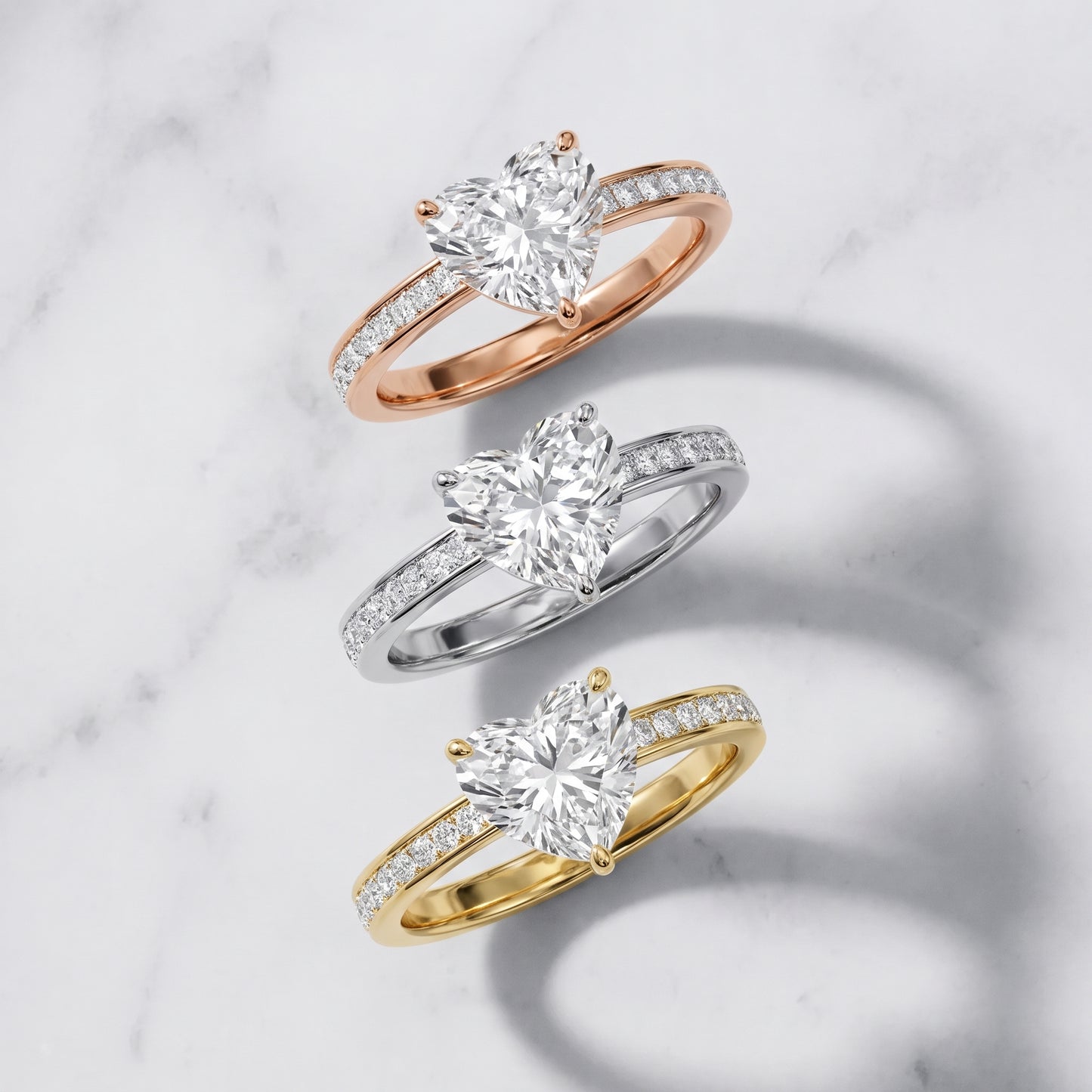 Brielle Channel Set Solitaire Heart Diamond Ring in Yellow Gold - 3rings.jpg