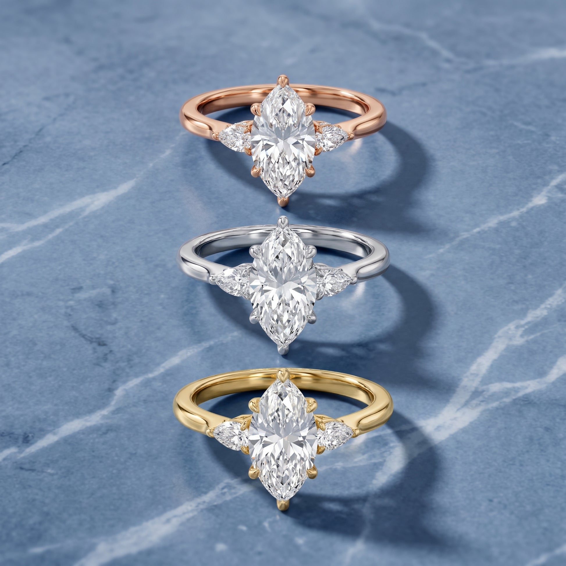 Leila Three-Stone Marquise Diamond Engagement Ring in Rose Gold - 3rings.jpg