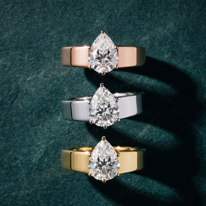 Susannah Wide Band Solitaire Pear Diamond Engagement Ring in Yellow Gold - 3rings.jpg