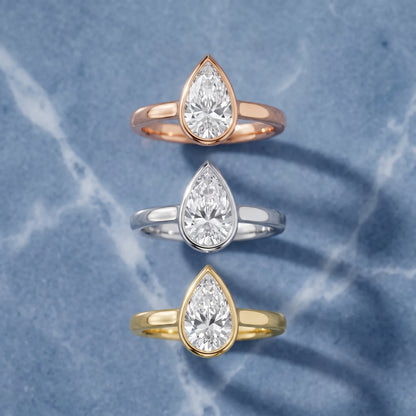 Jolie Bezel Solitaire Pear Diamond Engagement Ring in Platinum - 3rings.jpg
