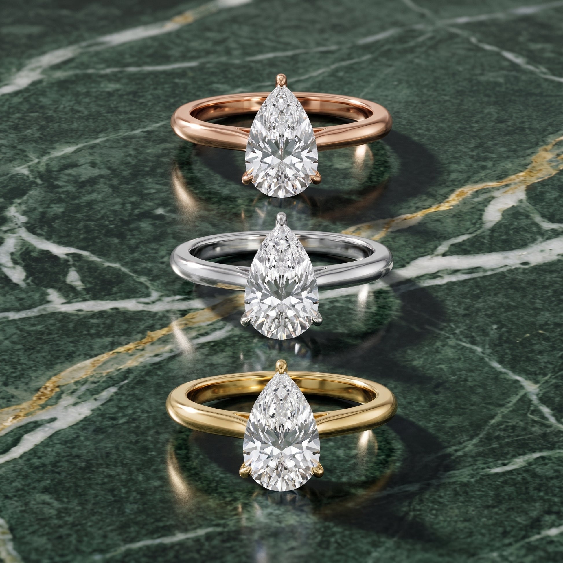 Kalia Knife Edge Solitaire Pear Diamond Engagement Ring in Rose Gold - 3rings.jpg
