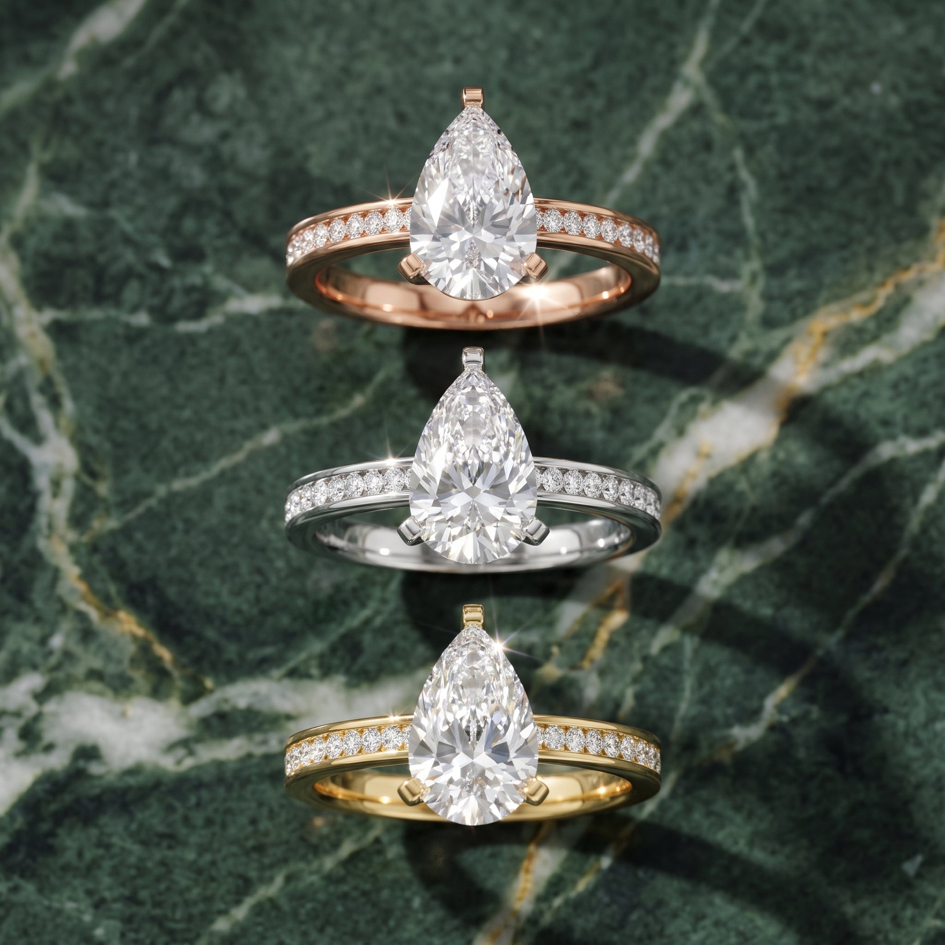 Tessa Solitaire Channel Set Pear Diamond Engagement Ring in Platinum - 3rings.jpg