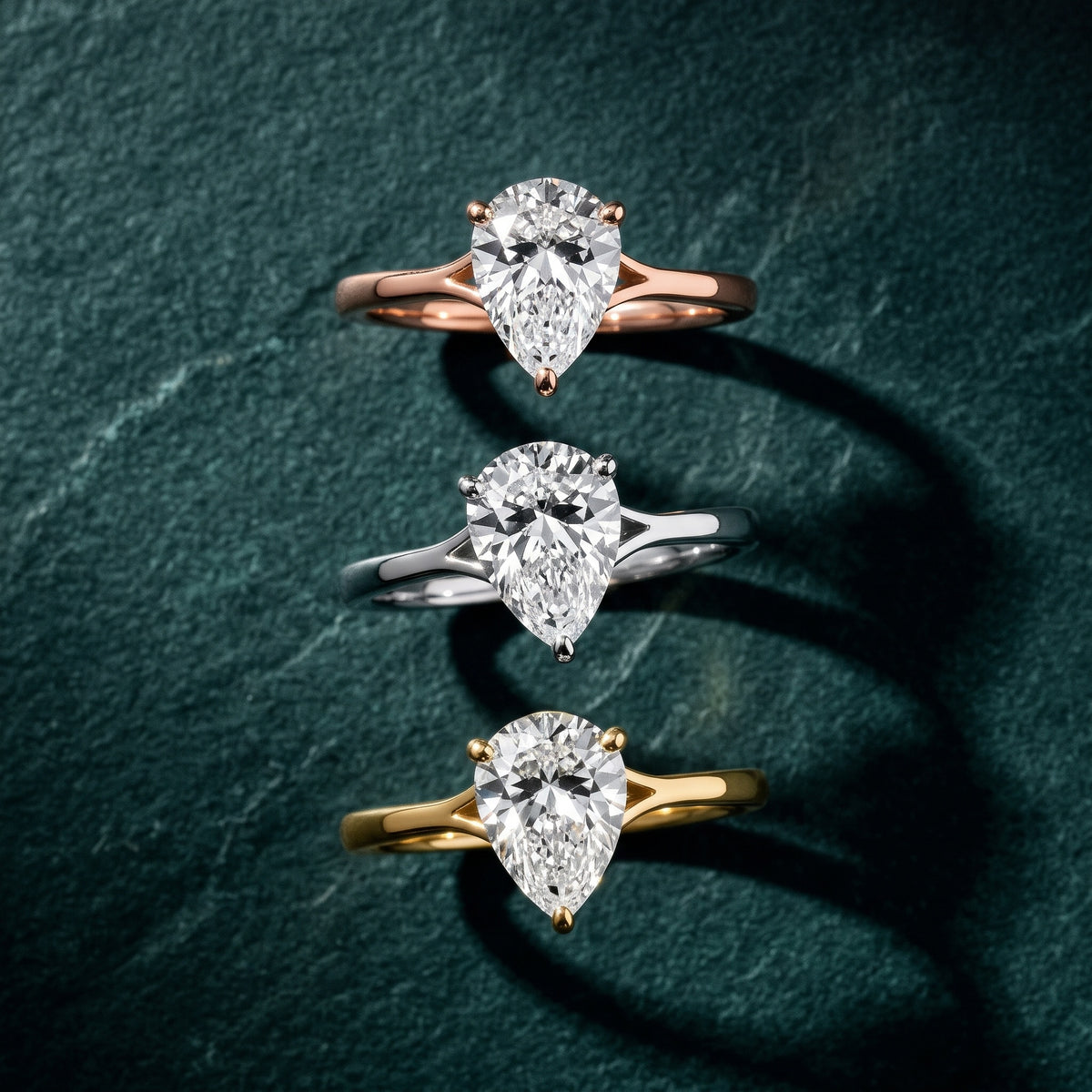Blanche Solitaire Split Shank Pear Diamond Engagement Ring in Yellow Gold - 3rings.jpg
