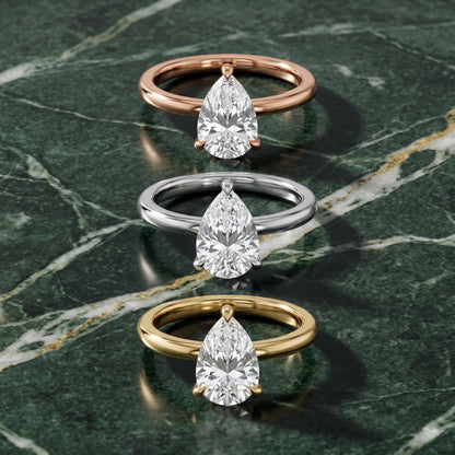 Nella Petite Solitaire Pear Diamond Engagement Ring in Platinum - 3rings.jpg