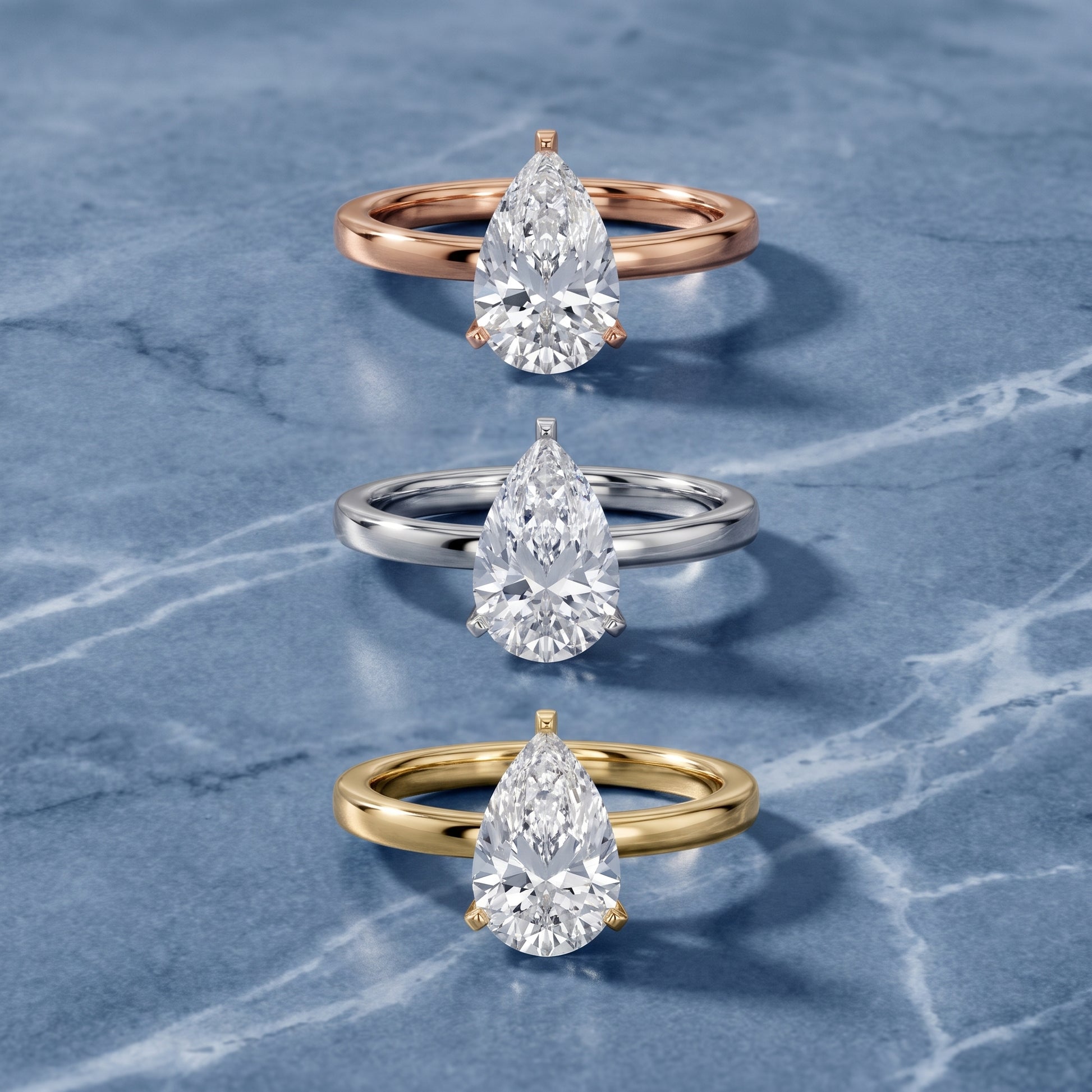Liana Solitaire Claw Prong Pear Diamond Engagement Ring in Yellow Gold - 3rings.jpg