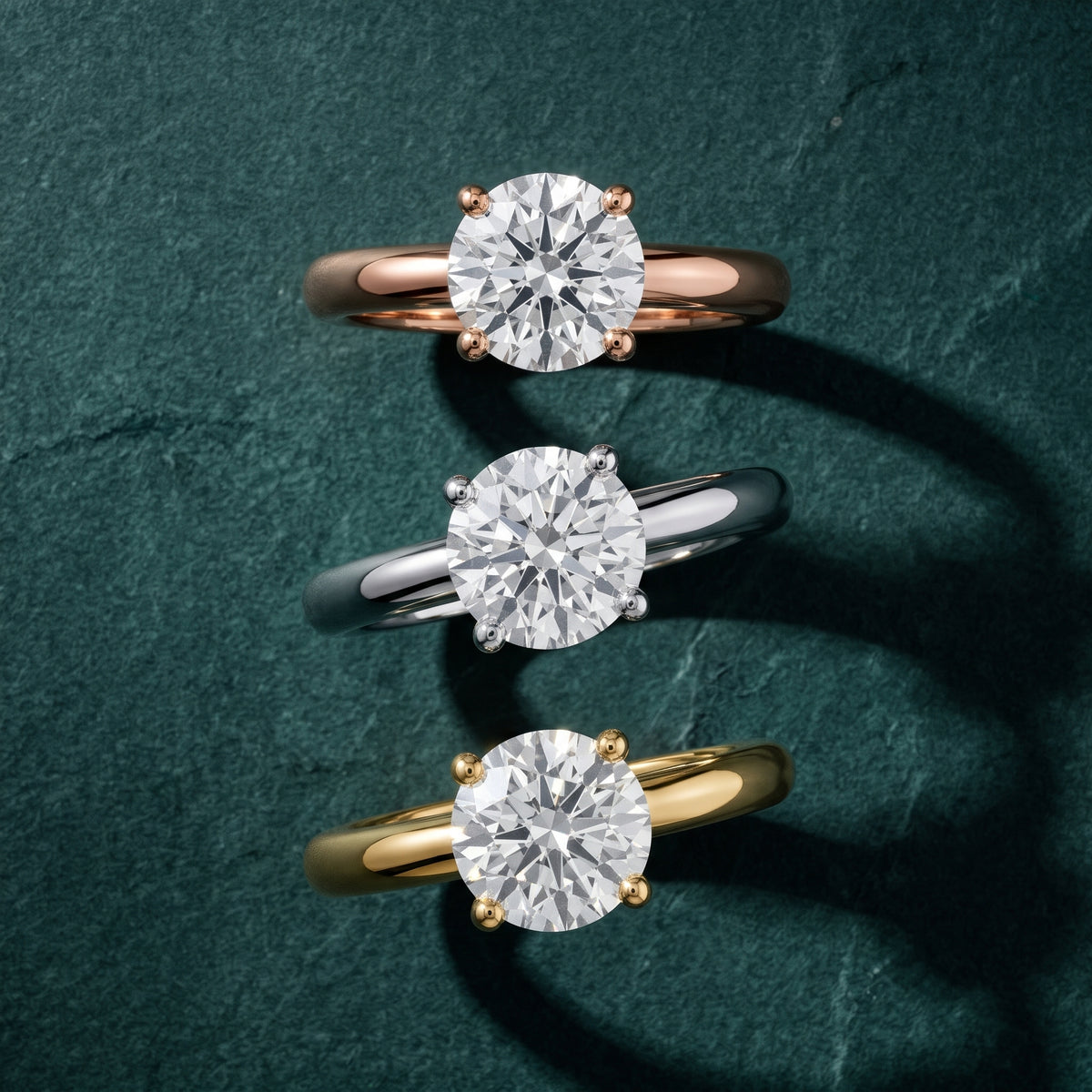 Clementine Solitaire Round Diamond Engagement Ring in Rose Gold - 3rings.jpg