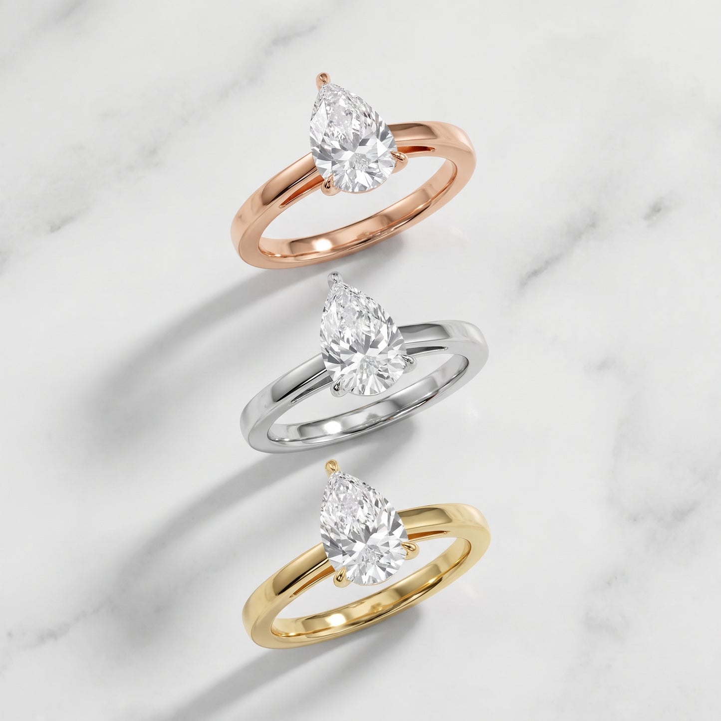 Kaia Solitaire Pear Diamond Ring in Rose Gold - 3rings.jpg