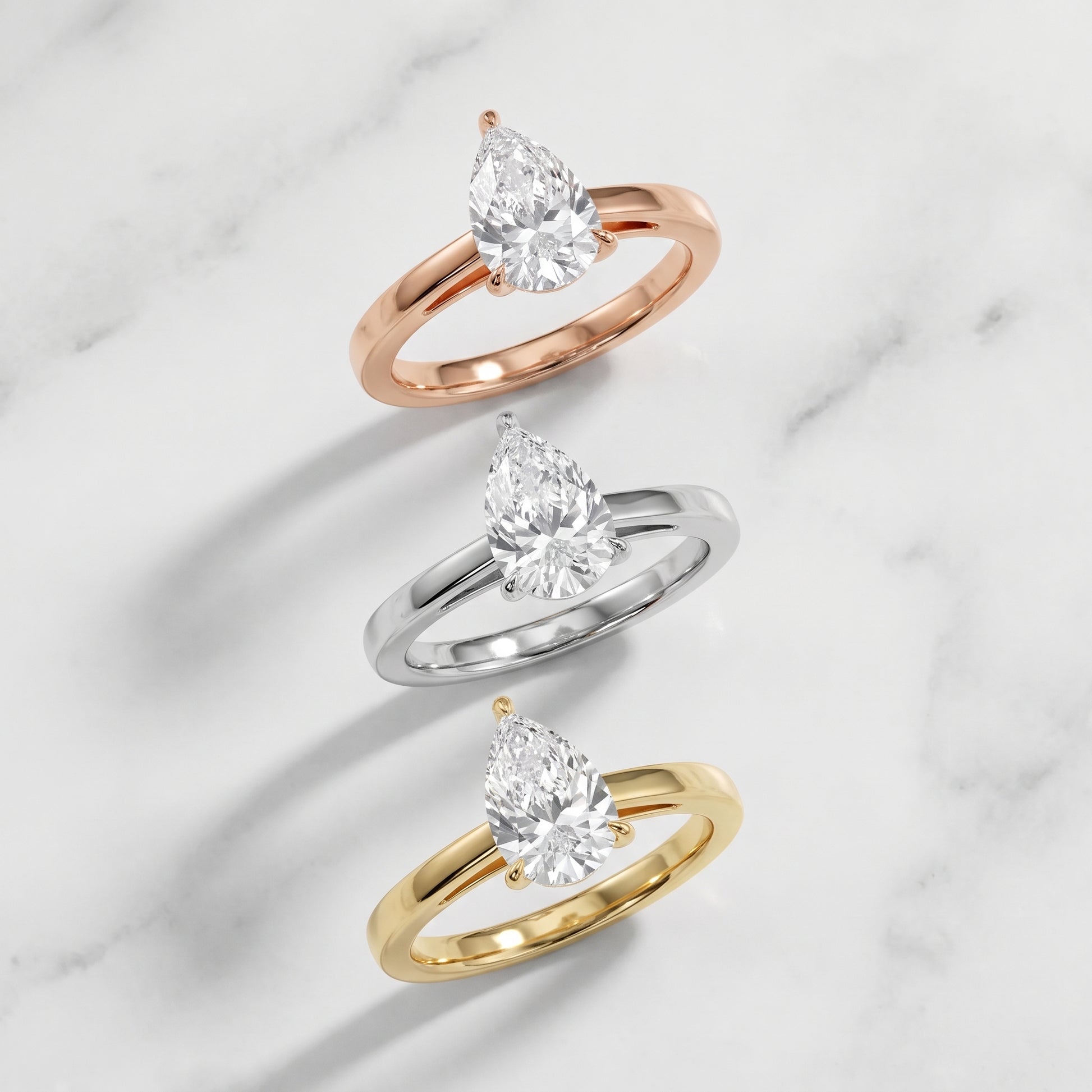 Kaia Solitaire Pear Diamond Ring in Rose Gold - 3rings.jpg