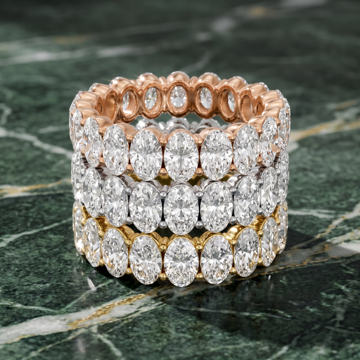 Marlowe Shared Prong Oval Diamond Eternity Band in Yellow Gold - 3rings.jpg