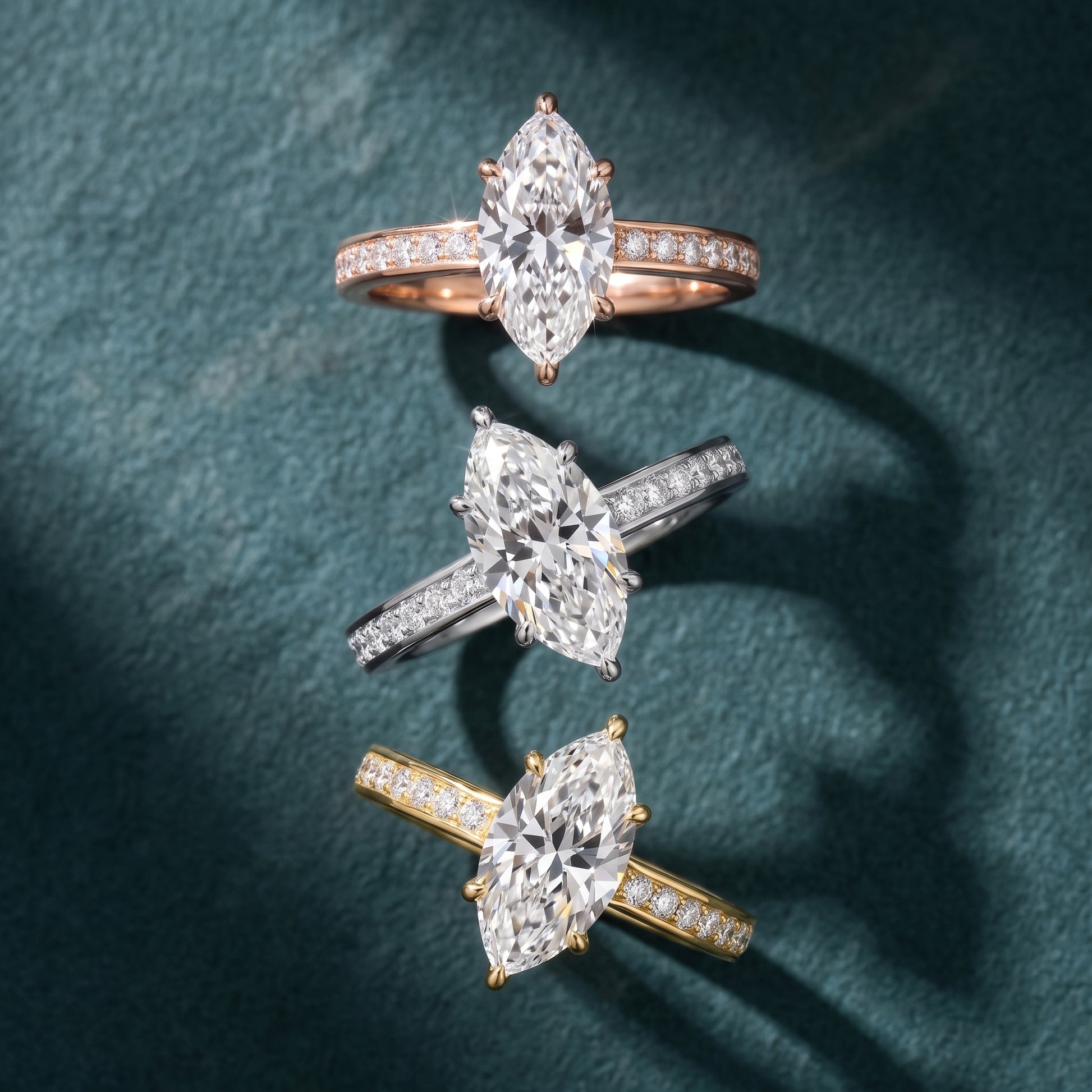 Brielle Channel Set Solitaire Marquise Diamond Ring in Rose Gold - 3rings.jpg