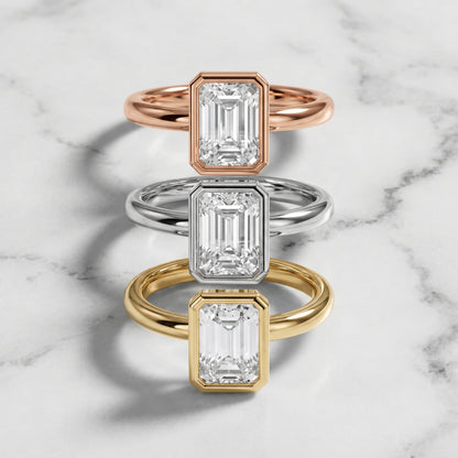 Maeve Bezel Solitaire Emerald Diamond Ring in Yellow Gold - 3rings.jpg