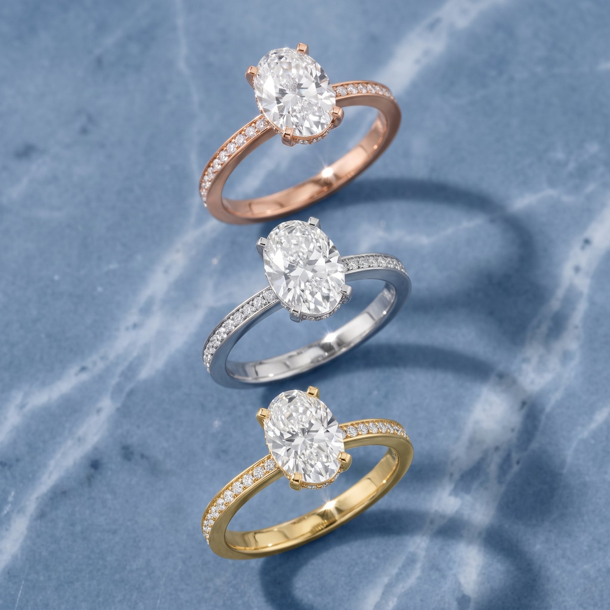 Naia Hidden Halo Oval Diamond Ring in Platinum - 3rings.jpg
