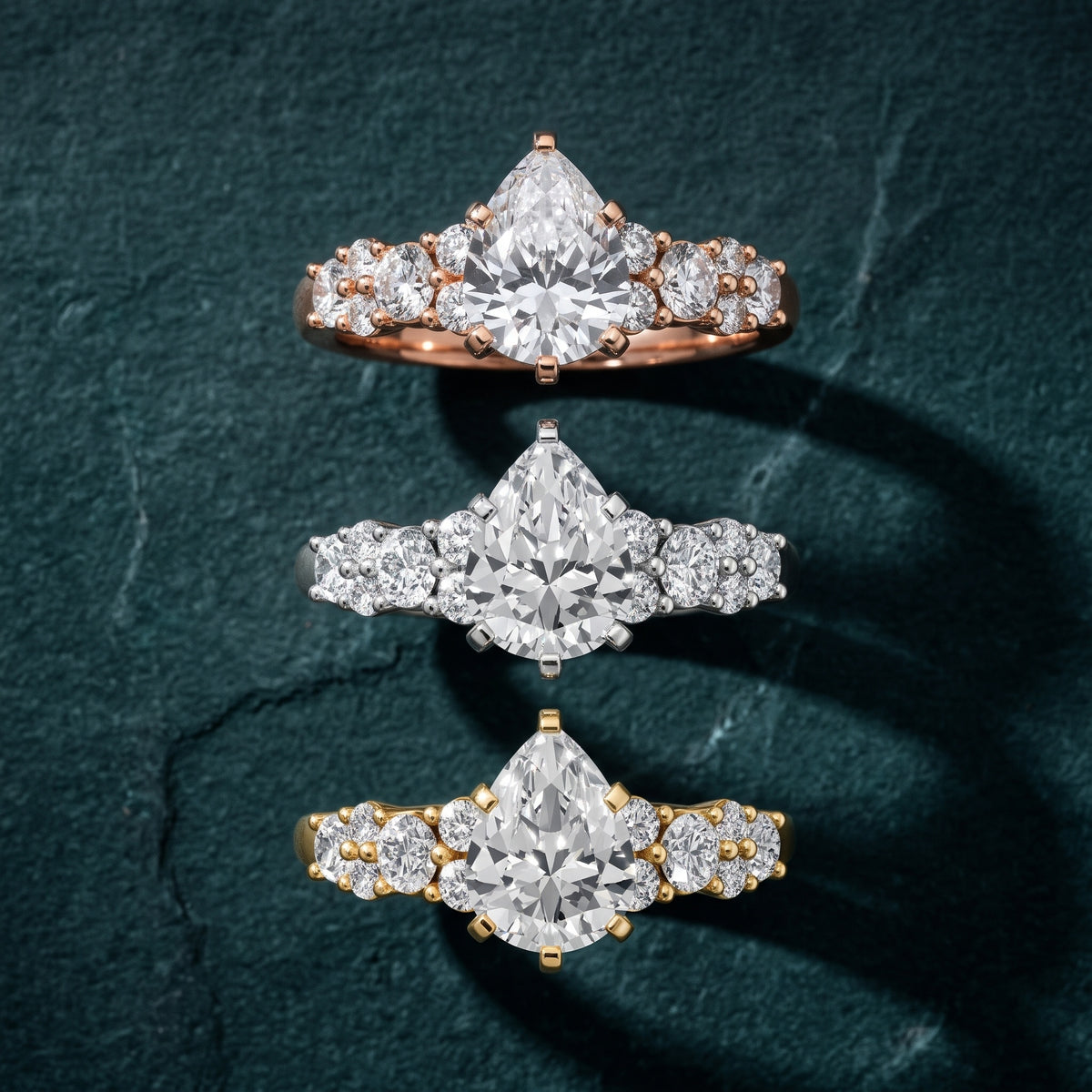 Roxana Graduated Cluster Pear Diamond Engagement Ring in White Gold - 3rings.jpg