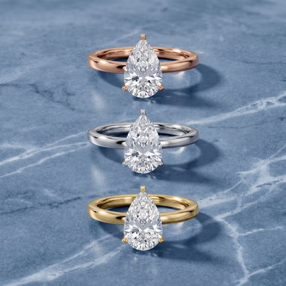 Liana Solitaire Claw Prong Pear Diamond Engagement Ring in Platinum - 3rings.jpg