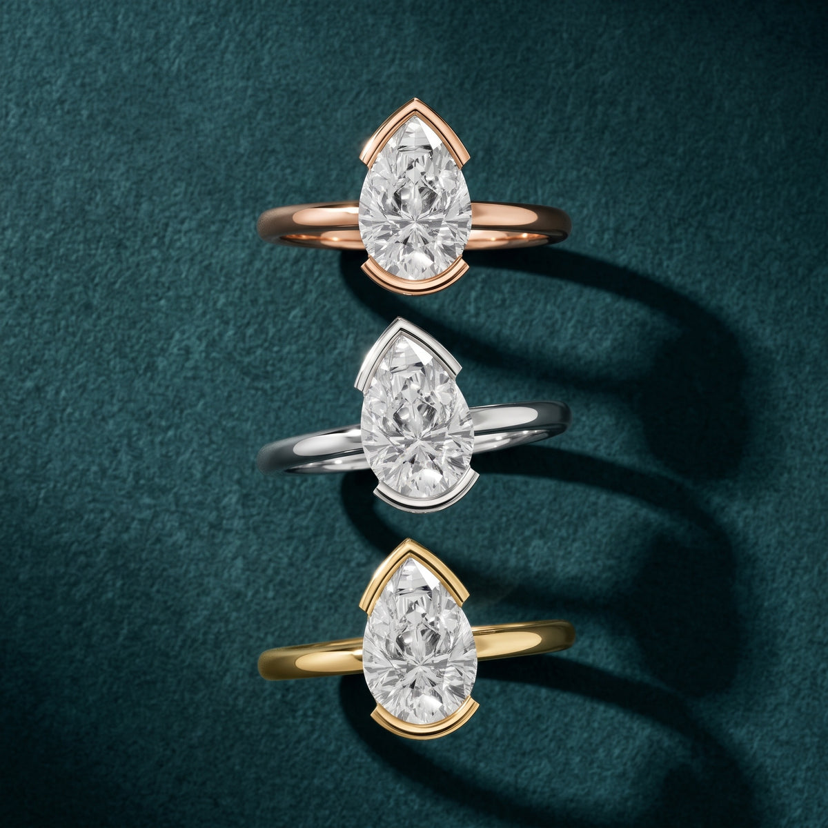 Bedford Half Bezel Solitaire Pear Diamond Engagement Ring in Silver - 3rings.jpg