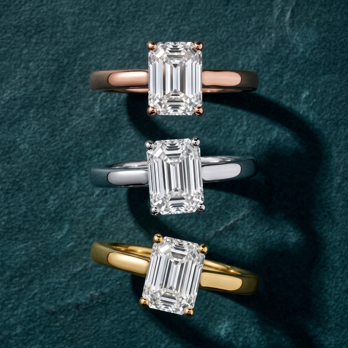 Emeline Solitaire Cathedral Emerald Diamond Engagement Ring in Yellow Gold - 3rings.jpg