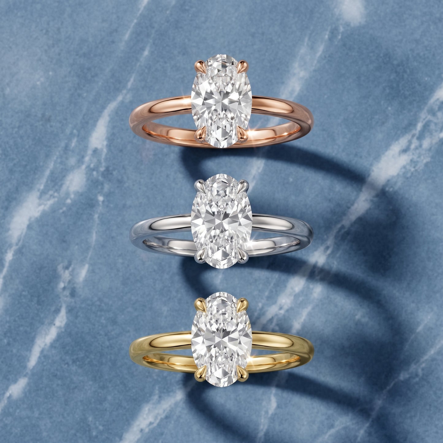 Nella Petite Solitaire Oval Diamond Engagement Ring in Rose Gold - 3rings.jpg