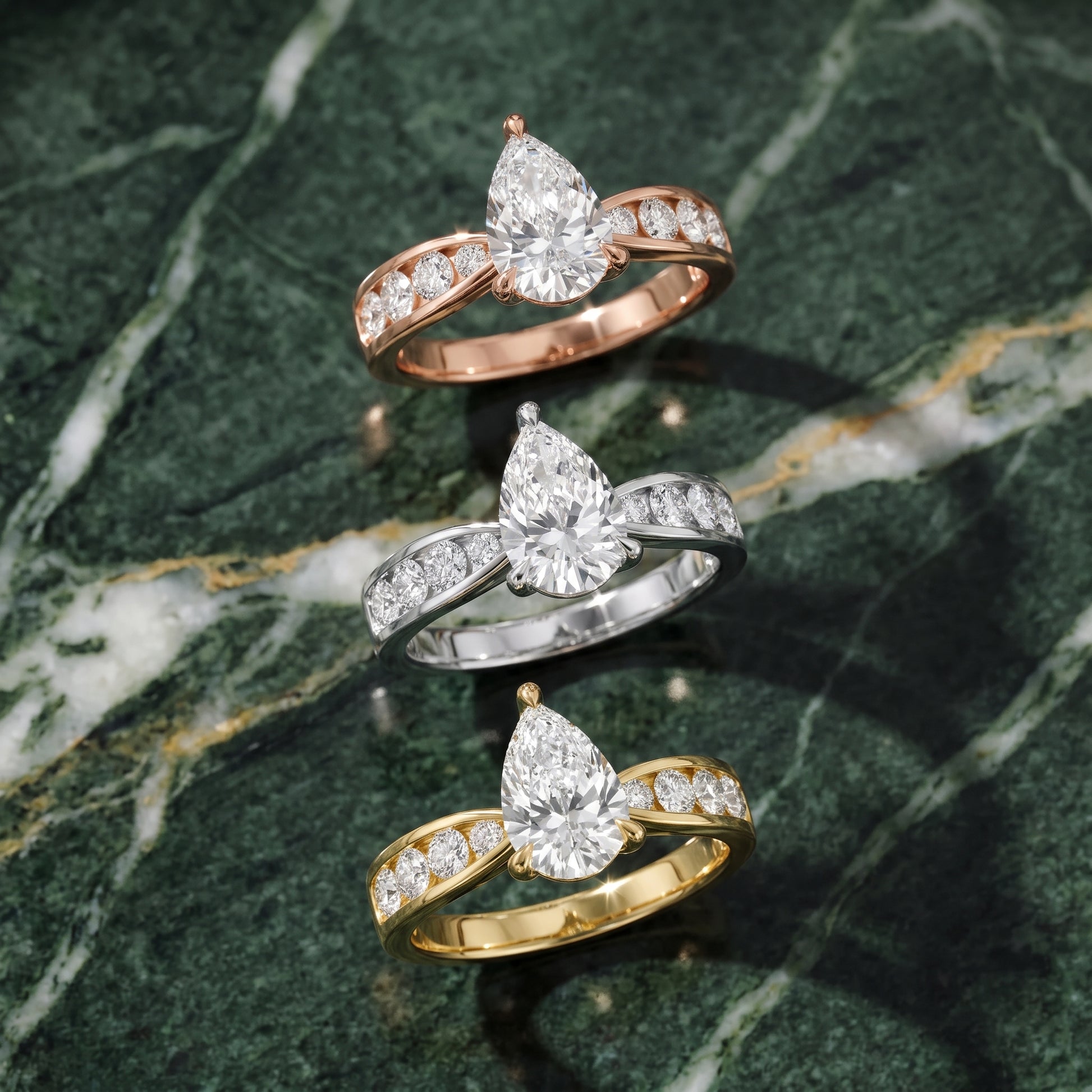 Noor Channel Set Sidestone Pear Diamond Engagement Ring in Rose Gold - 3rings.jpg